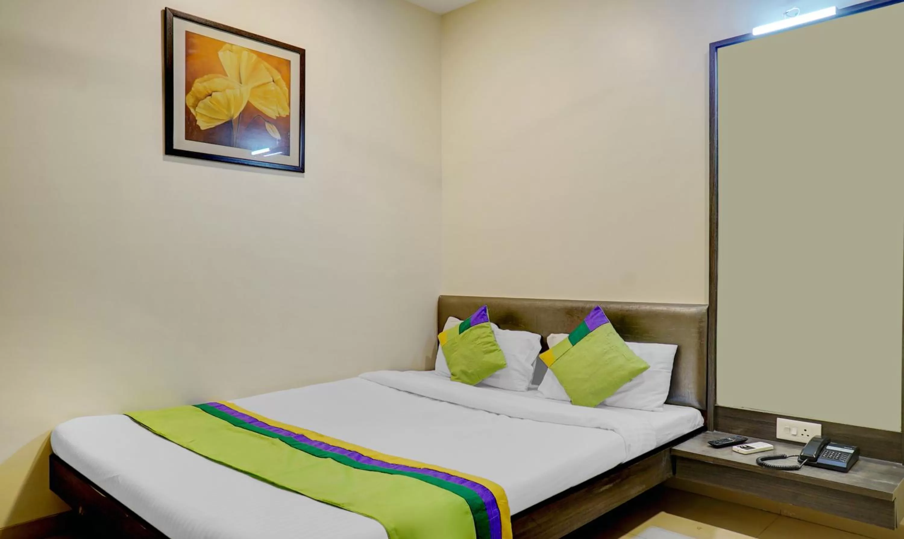 Bedroom, Bed in Treebo Bhagyashree Executive
