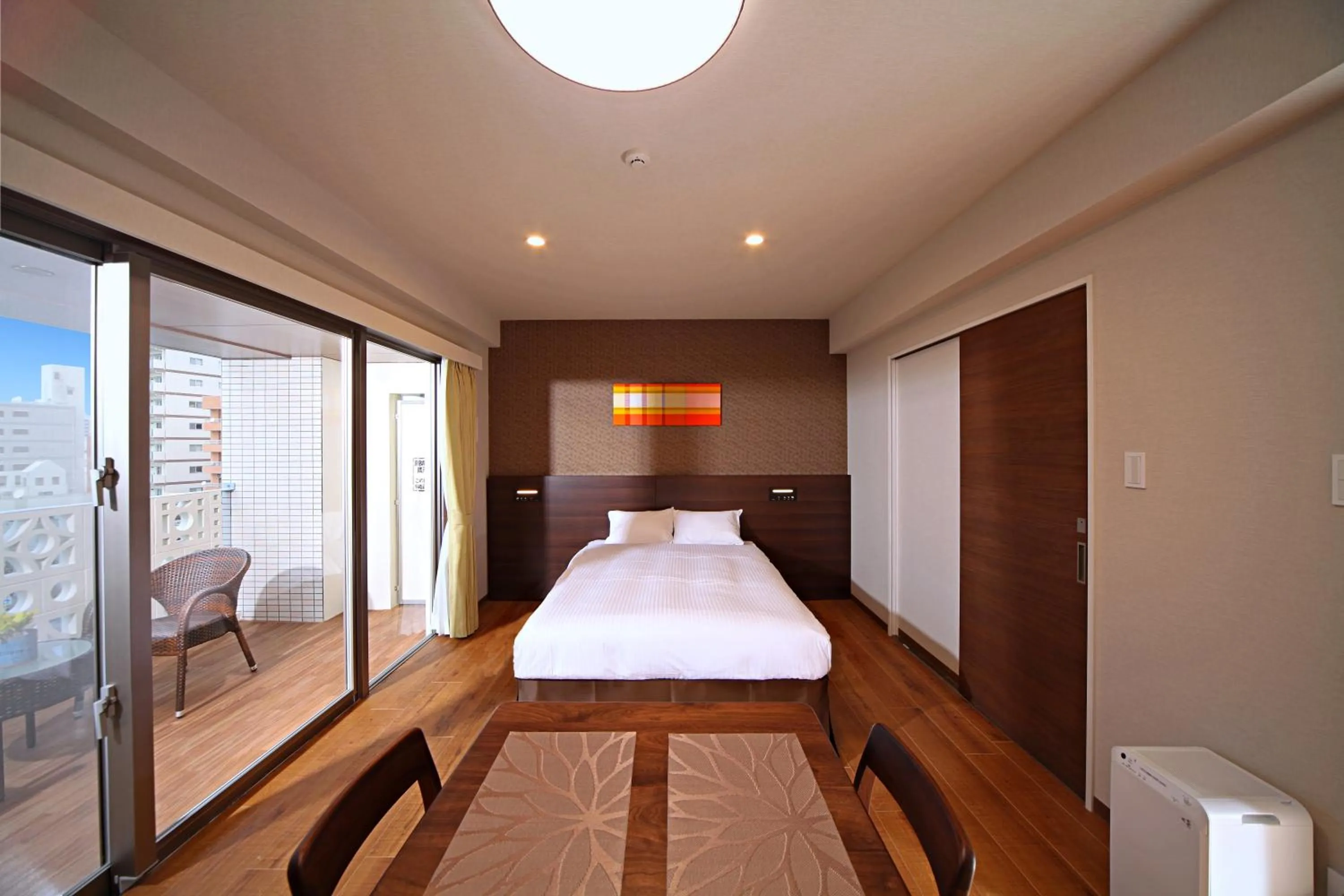 Photo of the whole room, Bed in Smart Condo Tomari