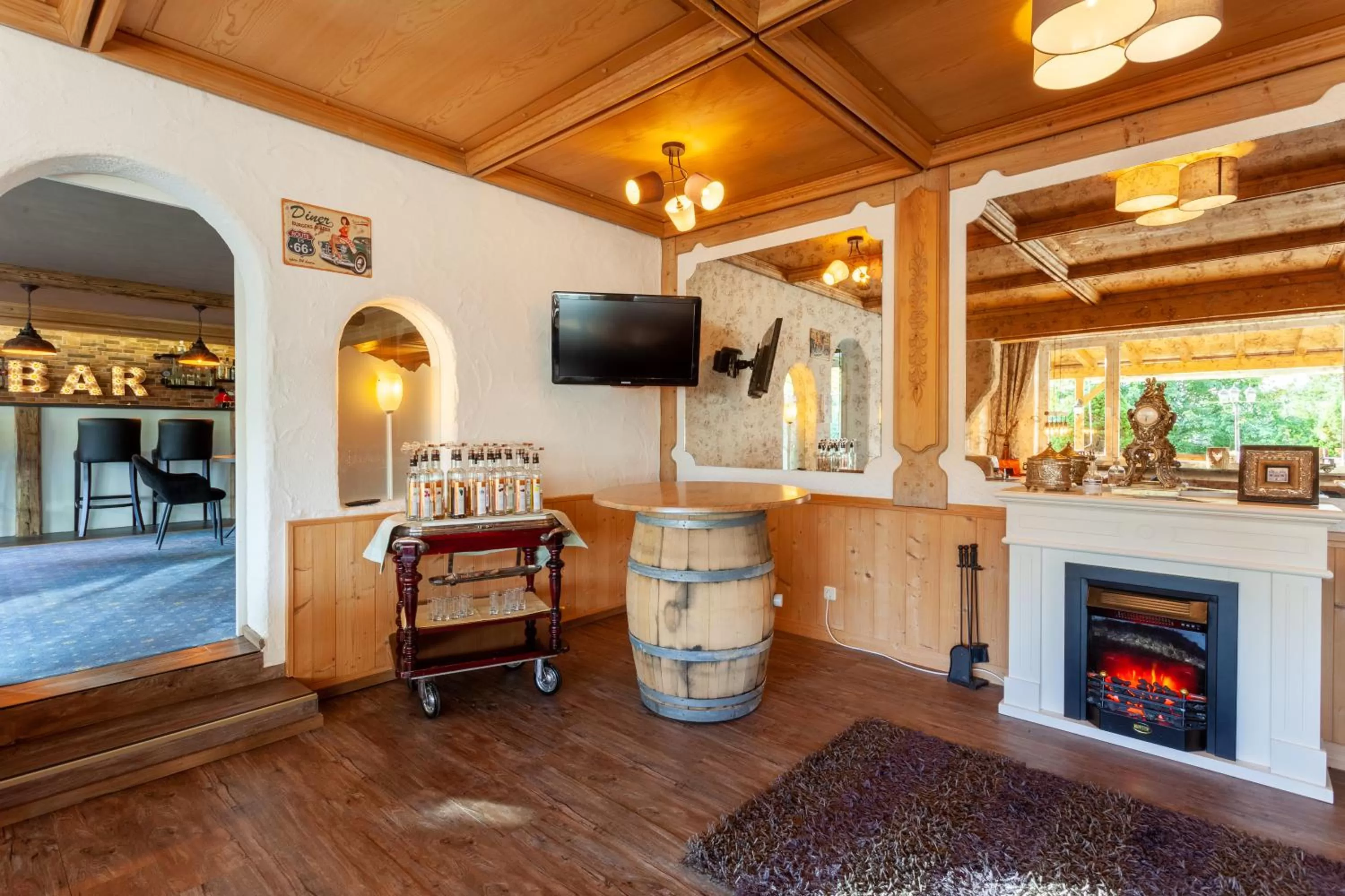 Communal lounge/ TV room in Parkhotel Tannenhof