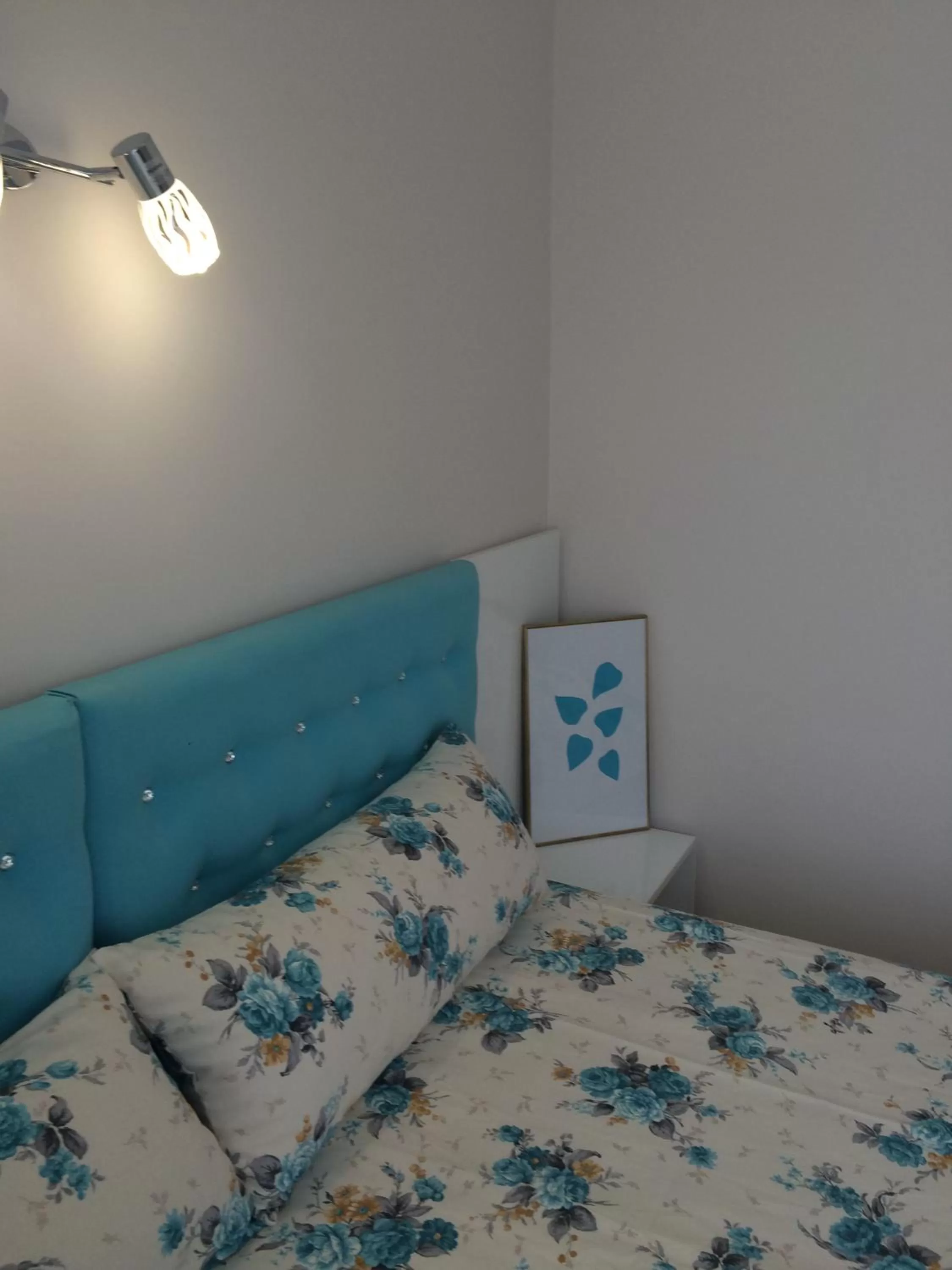 Bed in White Rose Guest Rooms