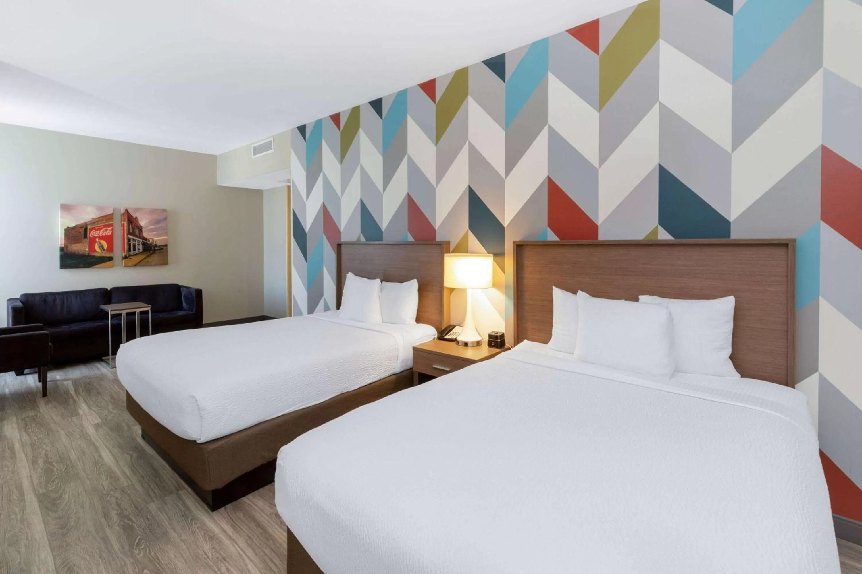 Photo of the whole room, Bed in La Quinta Inn & Suites by Wyndham Tulsa Downtown - Route 66