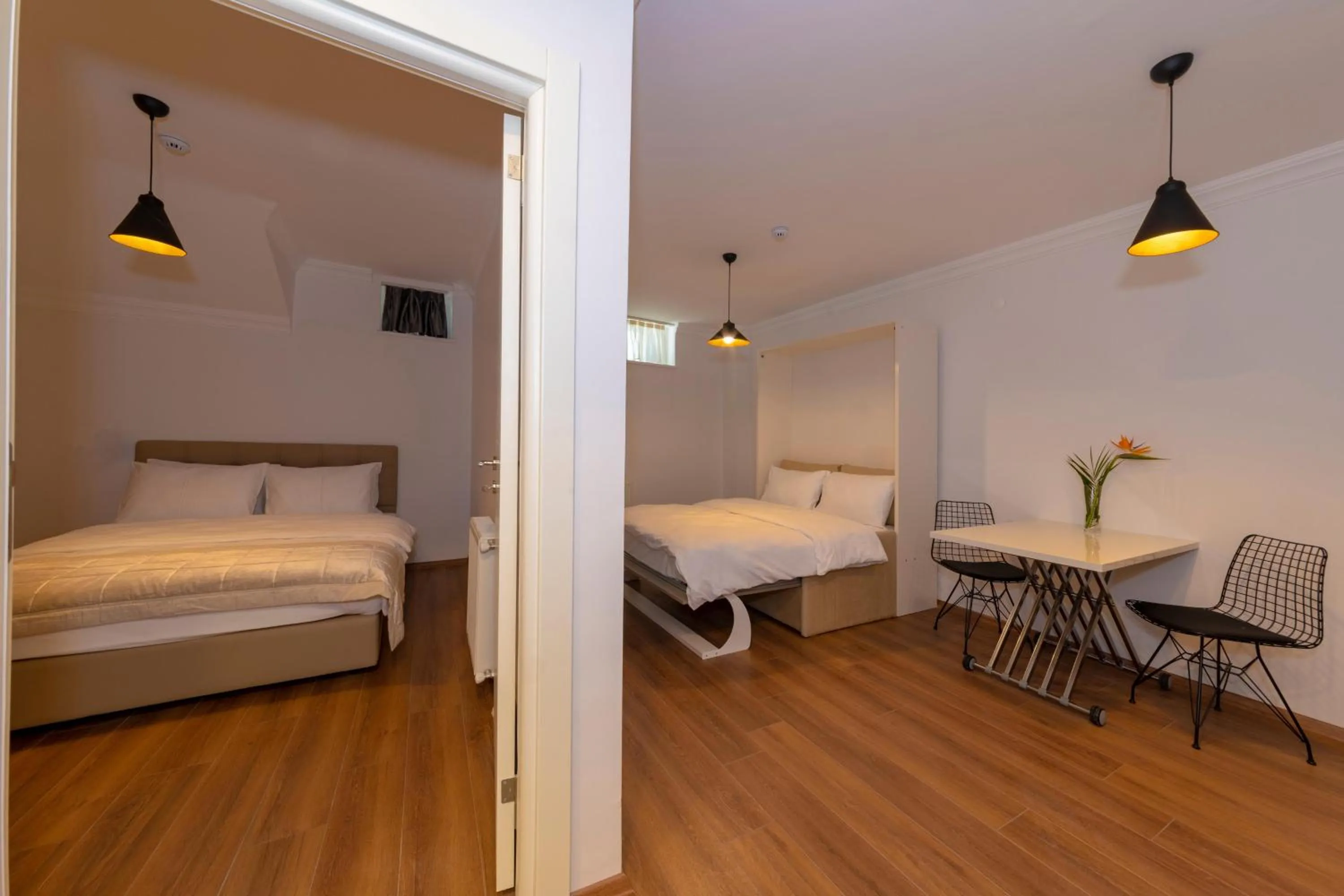 Photo of the whole room, Bed in Joy Suites