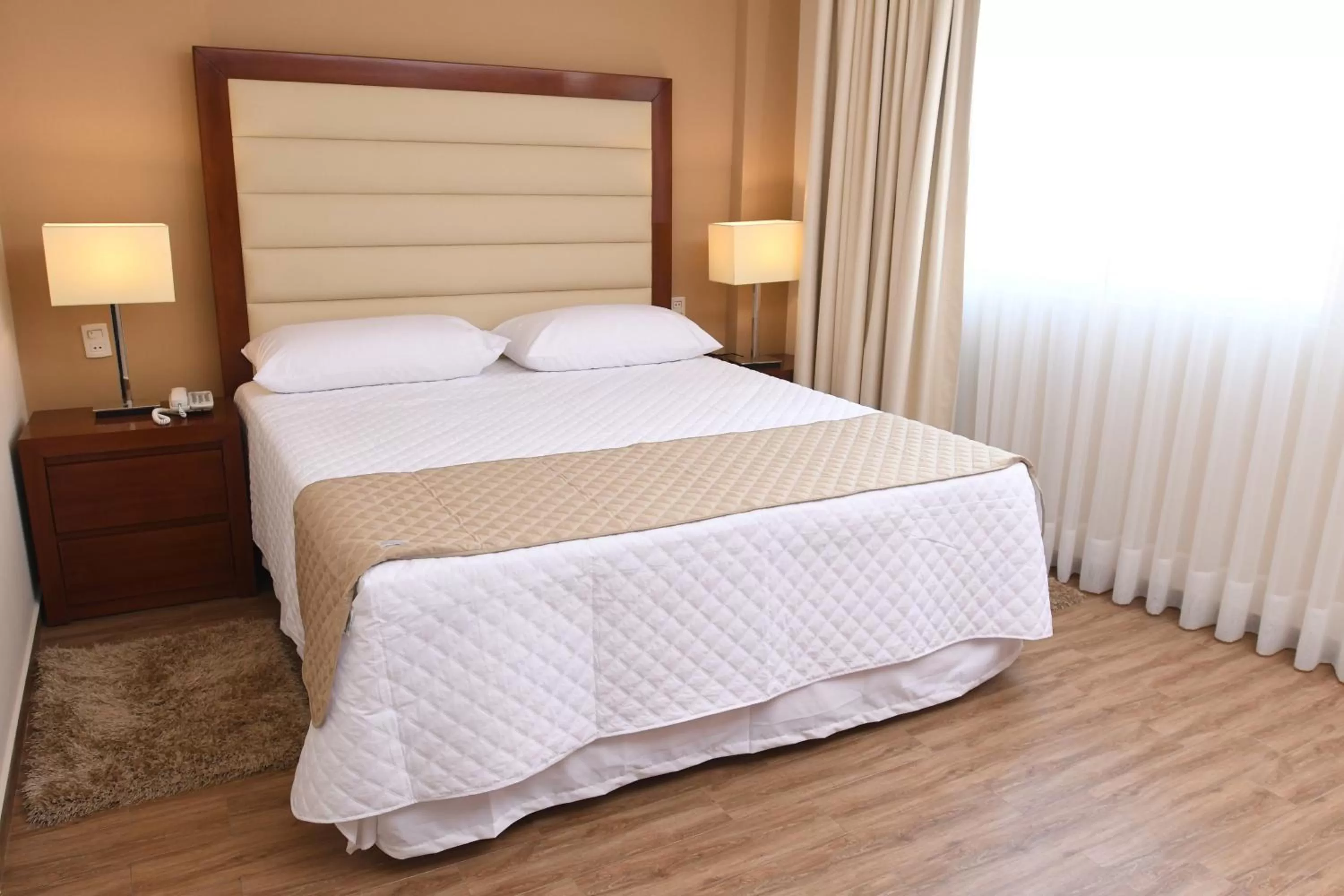 Bed in Taos Apart Hotel