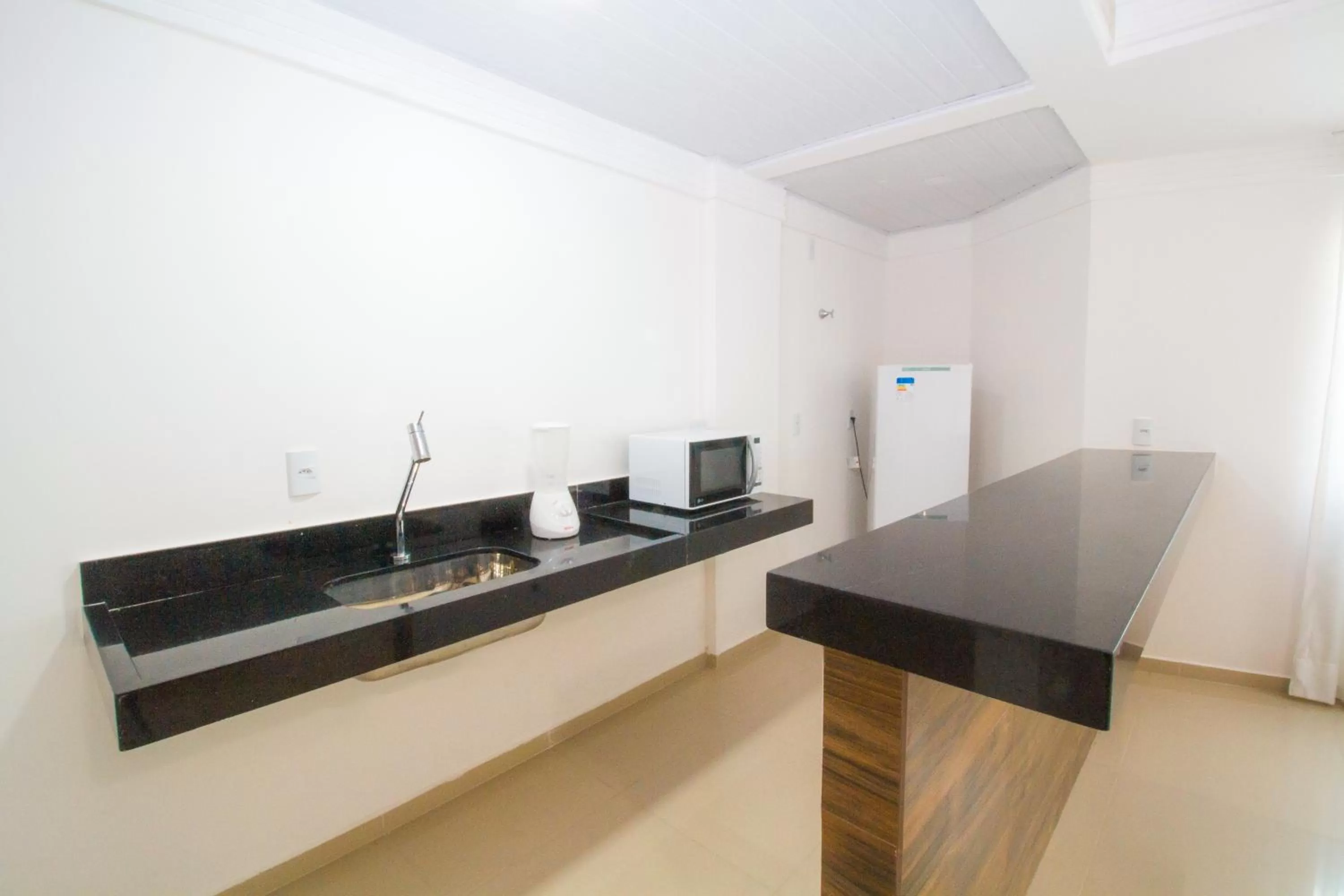 Kitchen or kitchenette in Portal Beach - Rede Soberano
