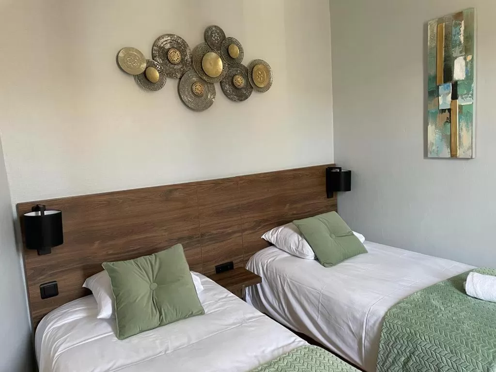 Bed in Hotel Le Rochegude