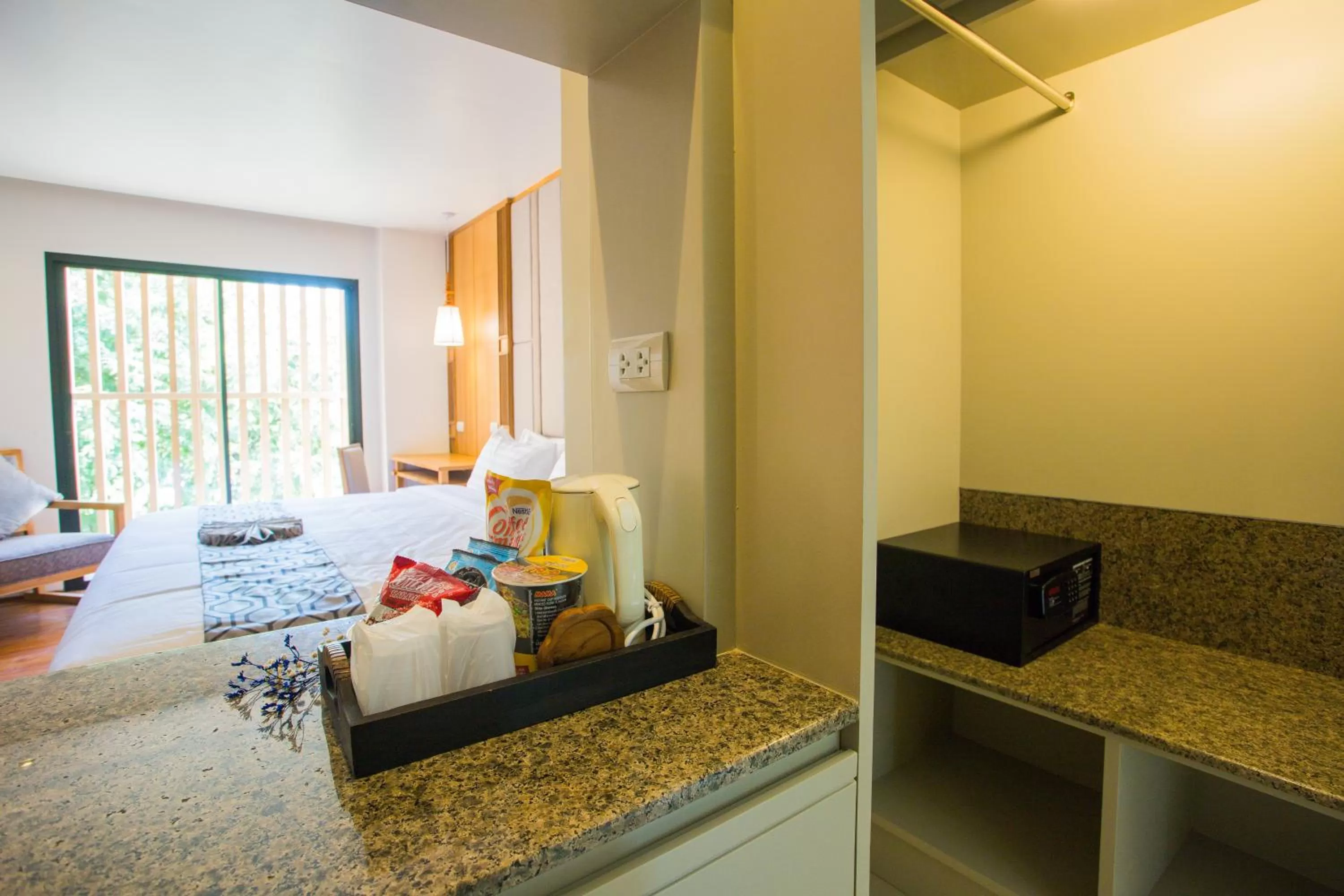 Bed in Lanna Thaphae Hotel