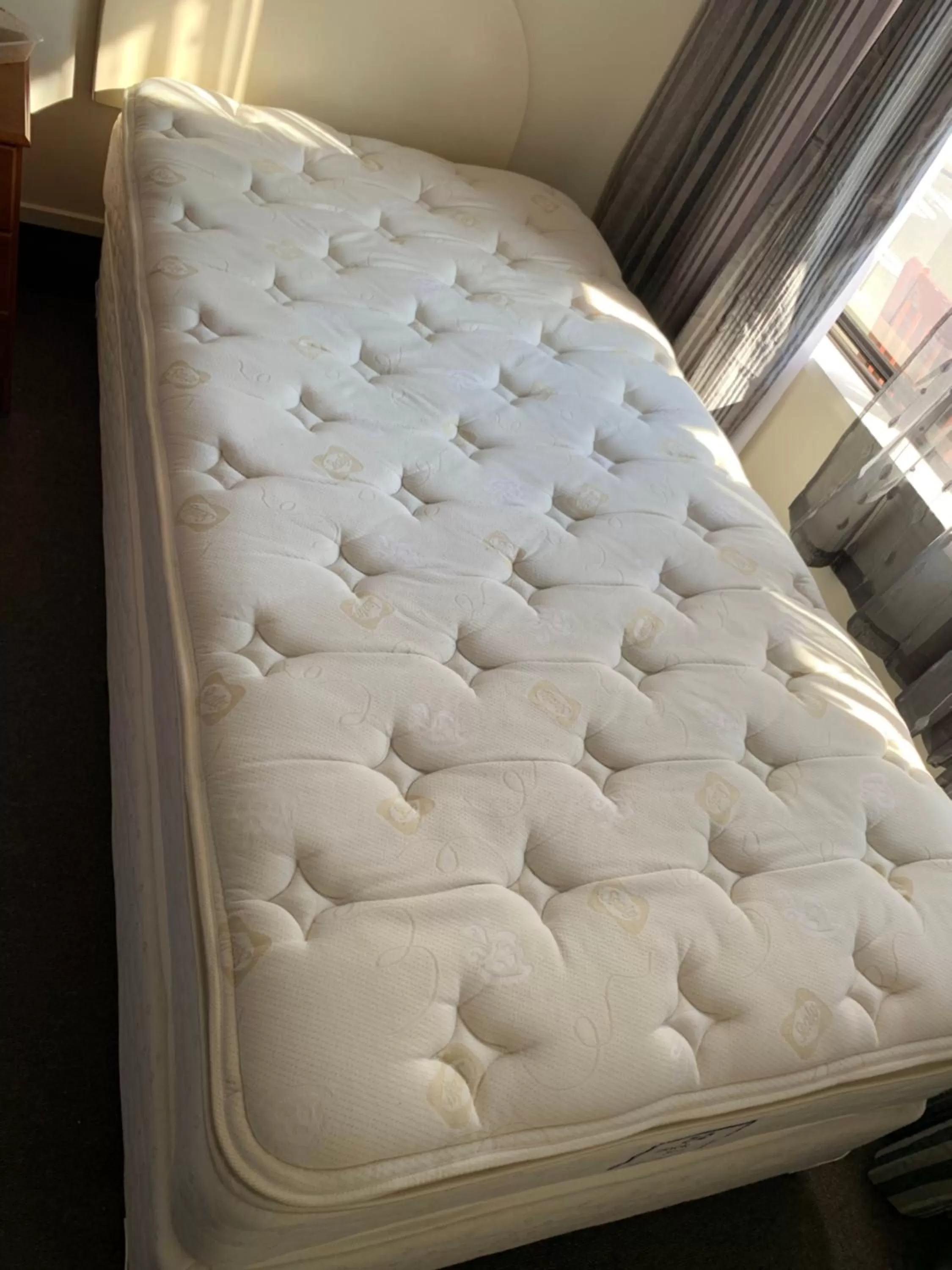 Bed in 755 Regal Court Motel