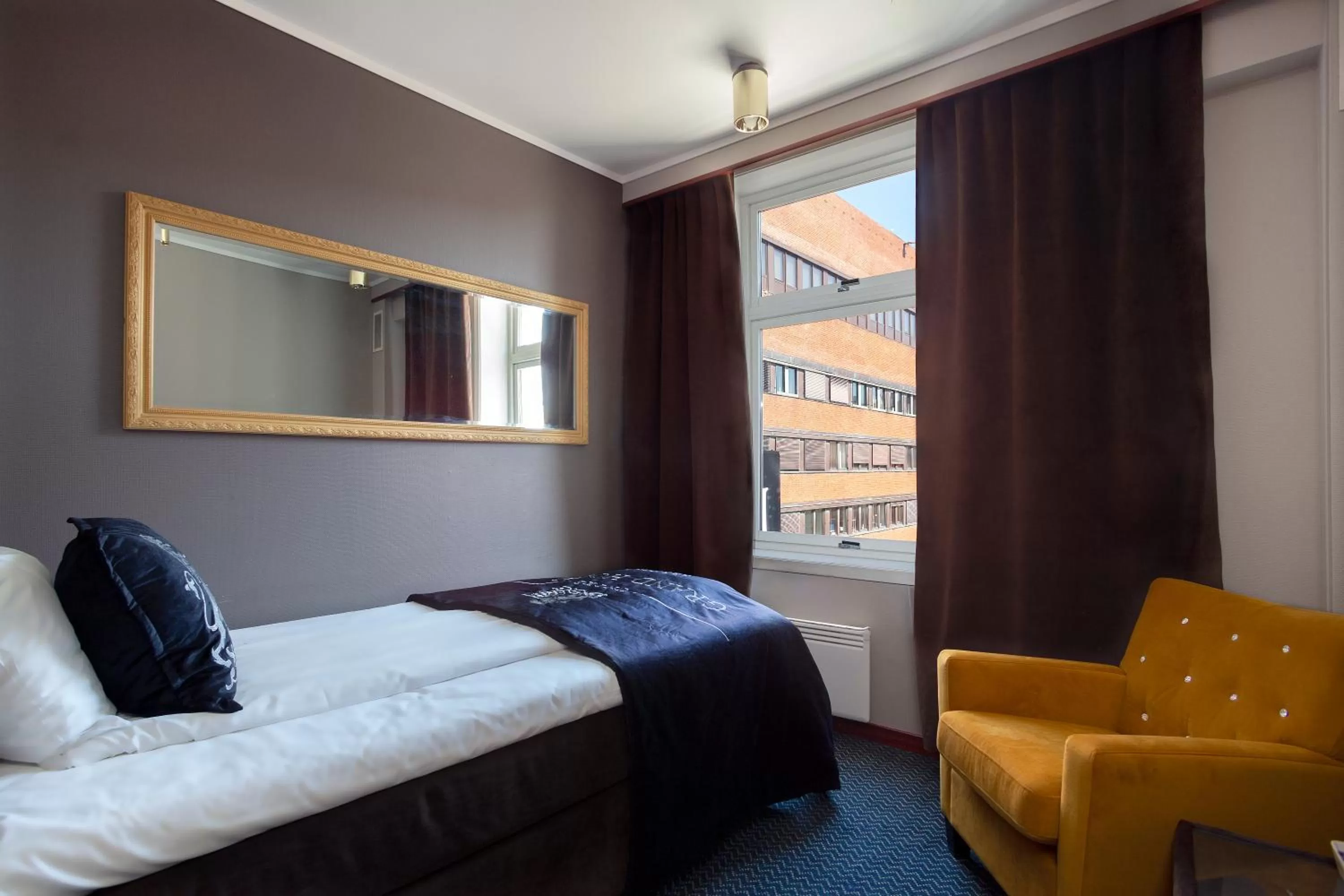 Bedroom, Bed in Grand Hotel Arendal - Unike Hoteller