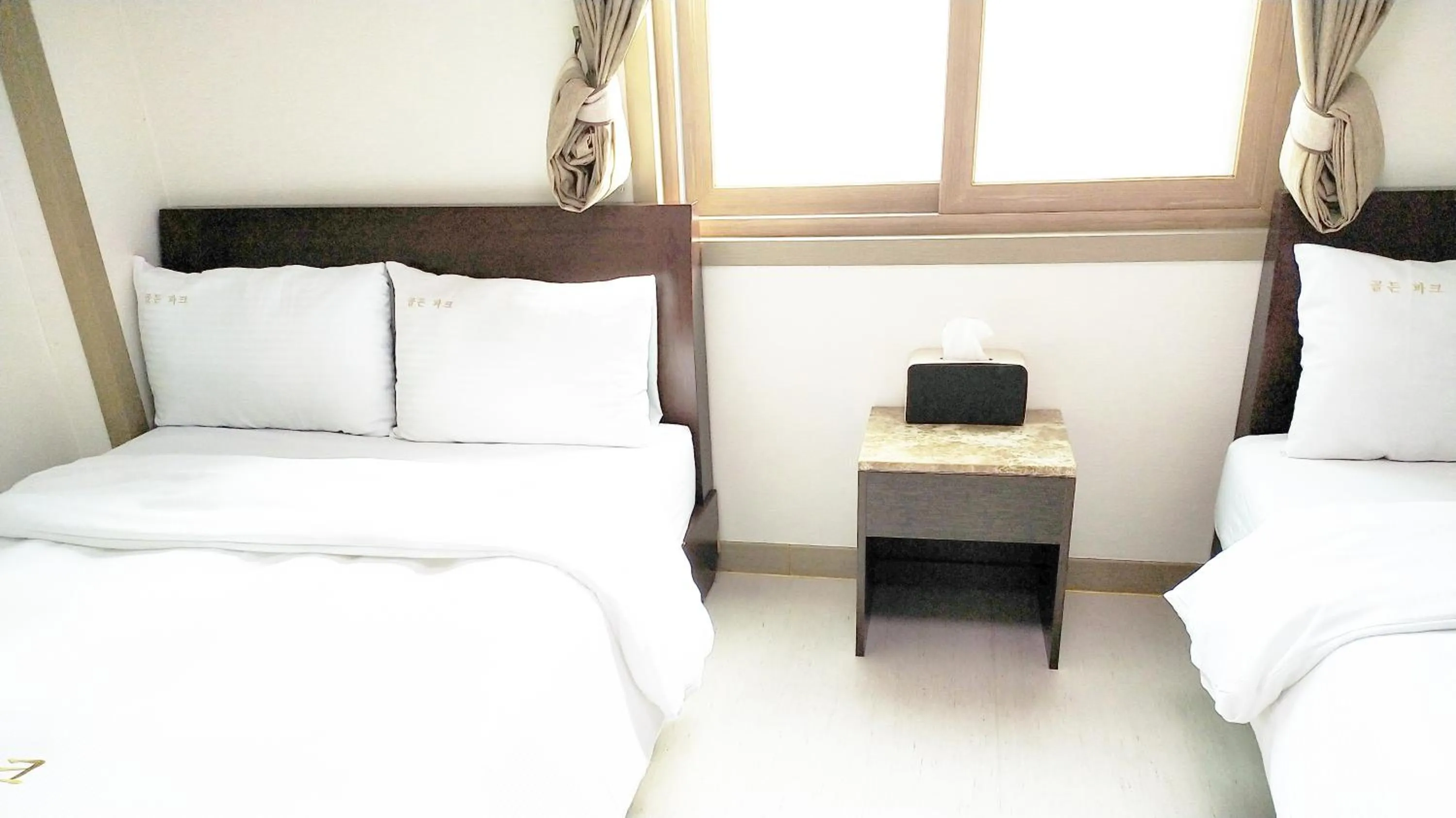 Bed in Golden Park Hotel