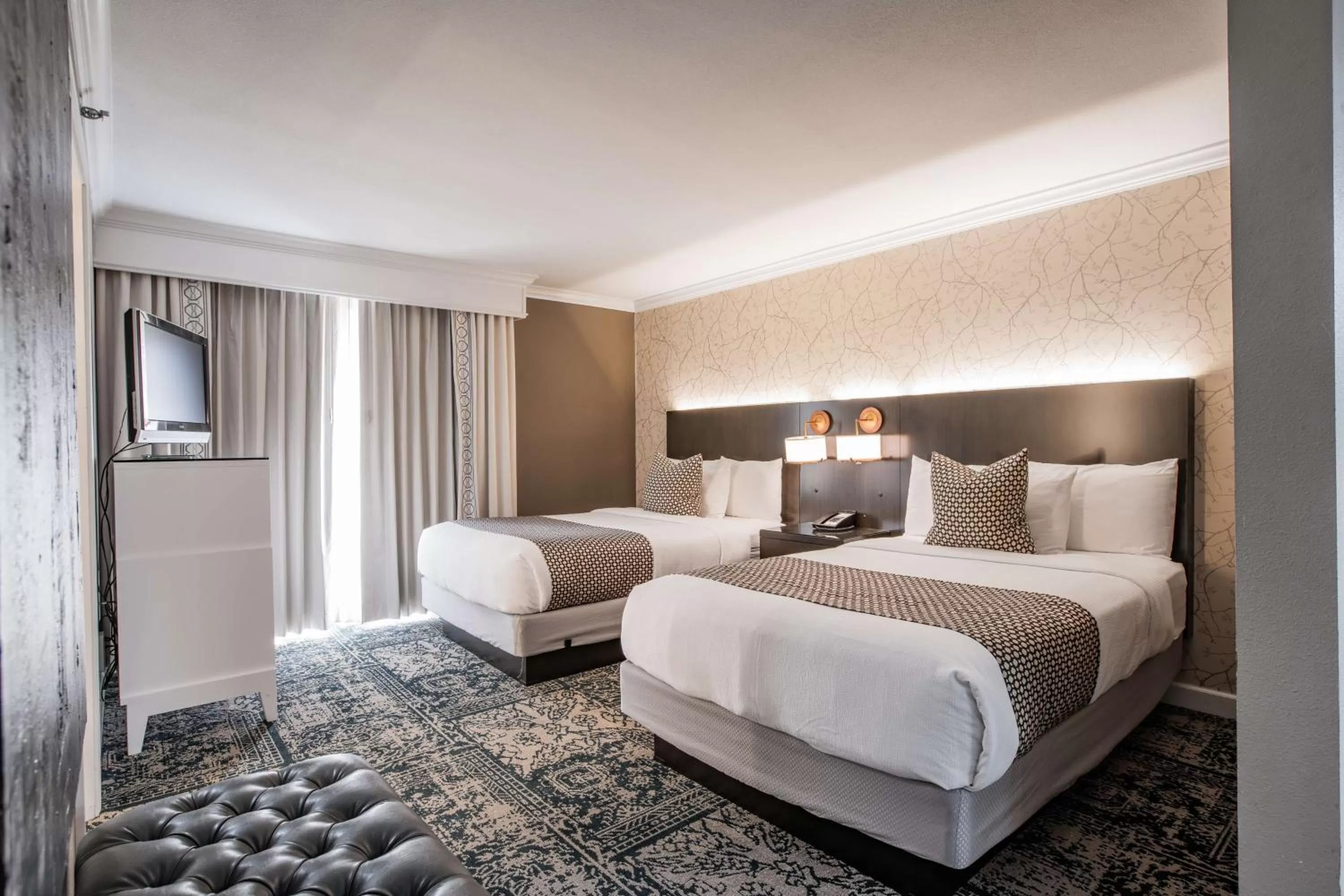 Bed in The Burgundy Hotel, Tapestry Collection by Hilton