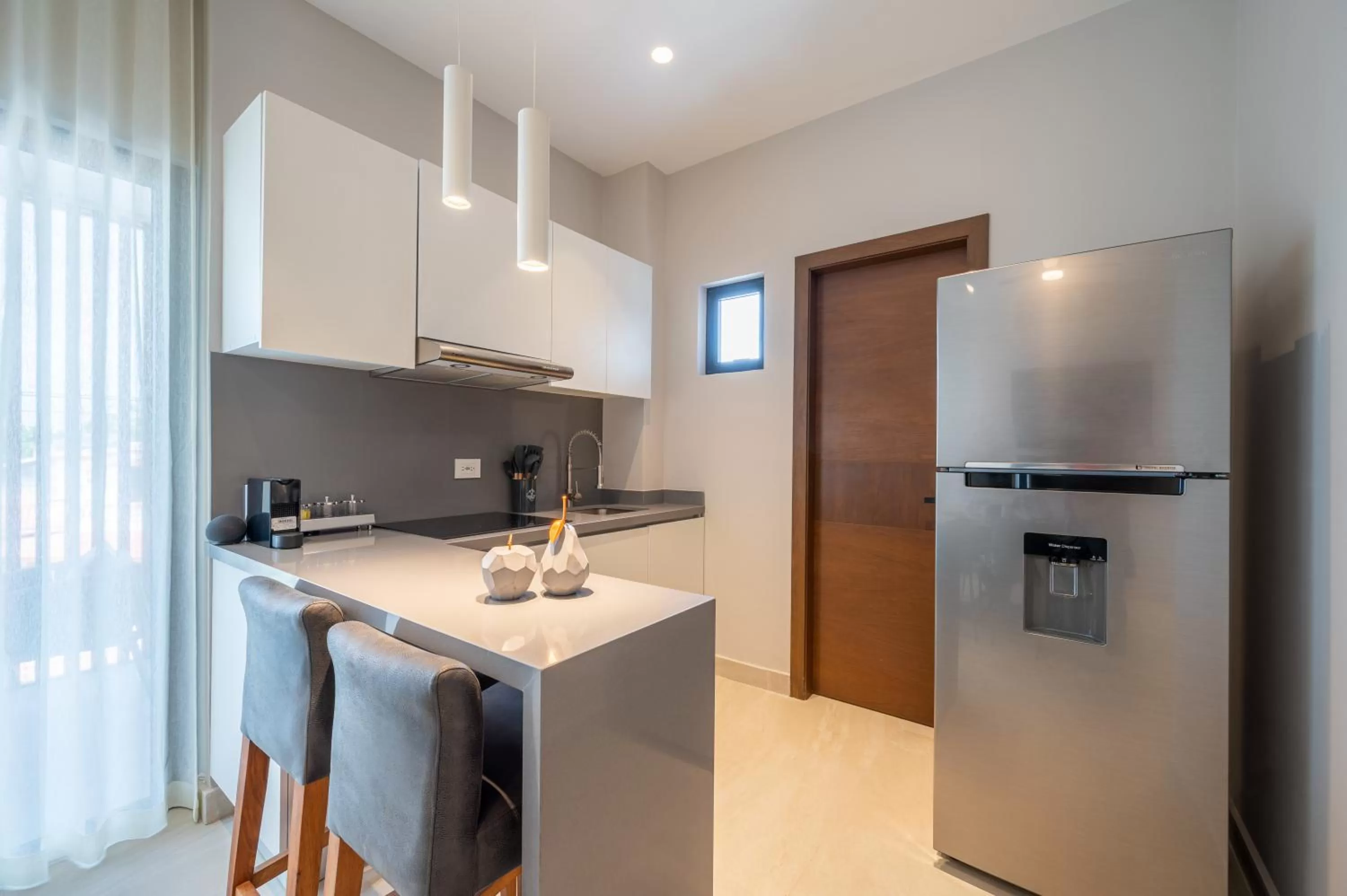 Kitchen or kitchenette in Kippal - Modern Oasis - ApartHotel