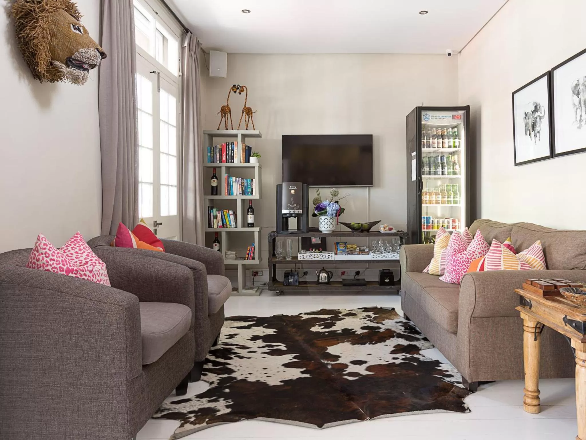 Communal lounge/ TV room in Long Street Boutique Hotel