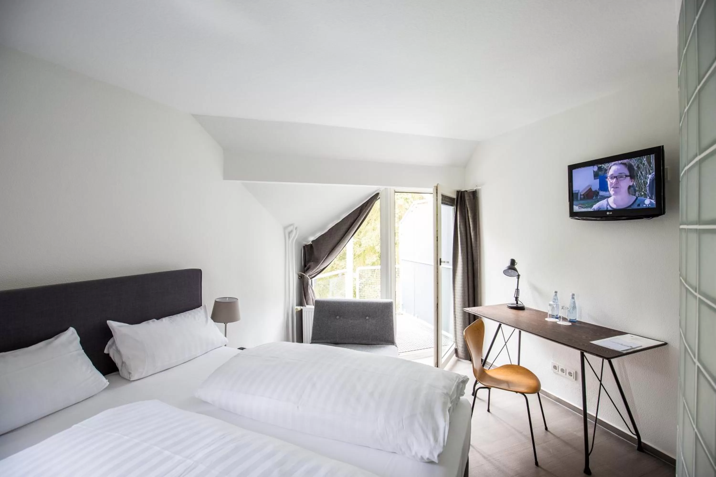 Photo of the whole room, Bed in Wald & Golfhotel Lottental