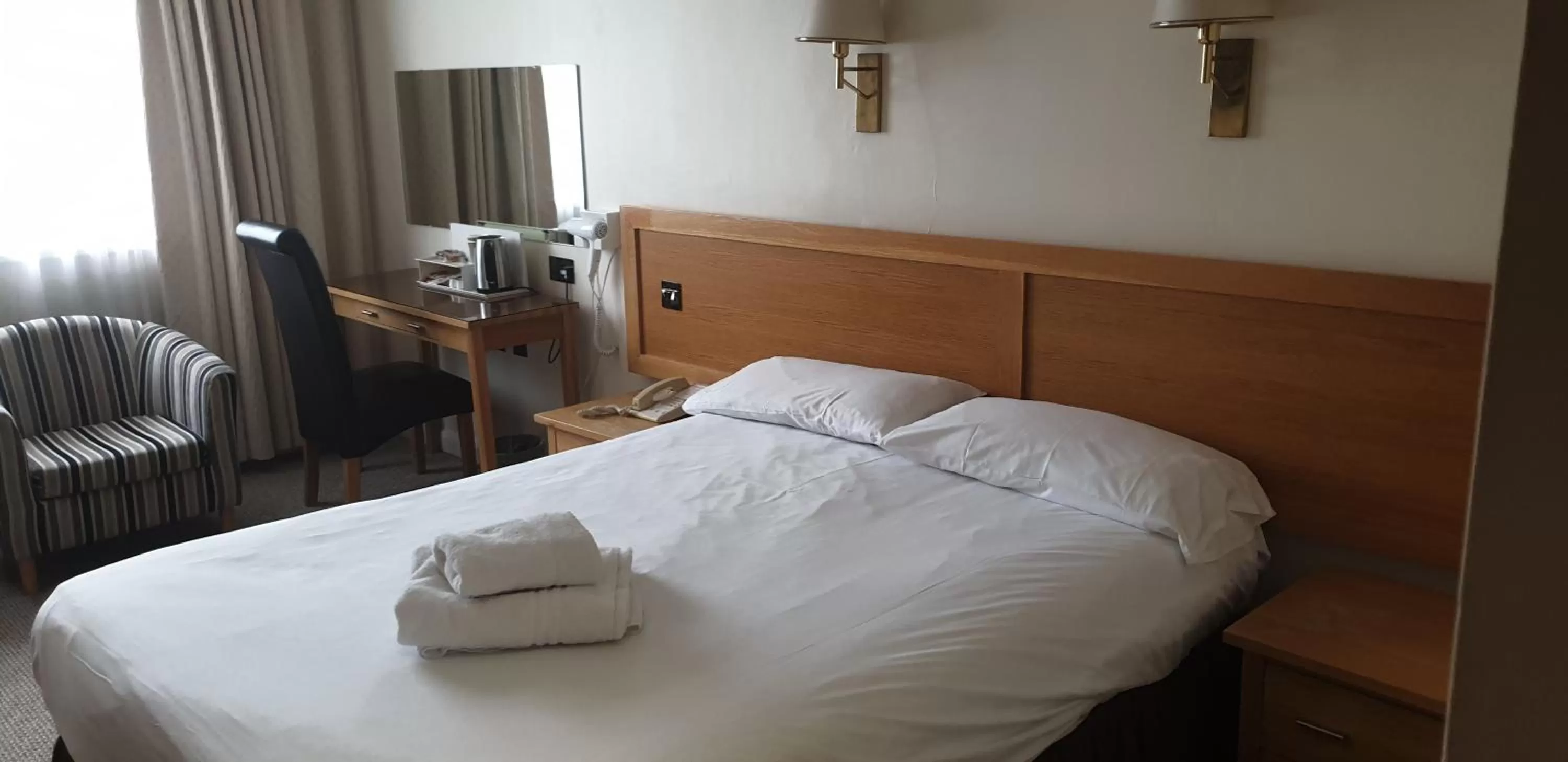 Bed in The Diplomat Hotel Restaurant & Spa