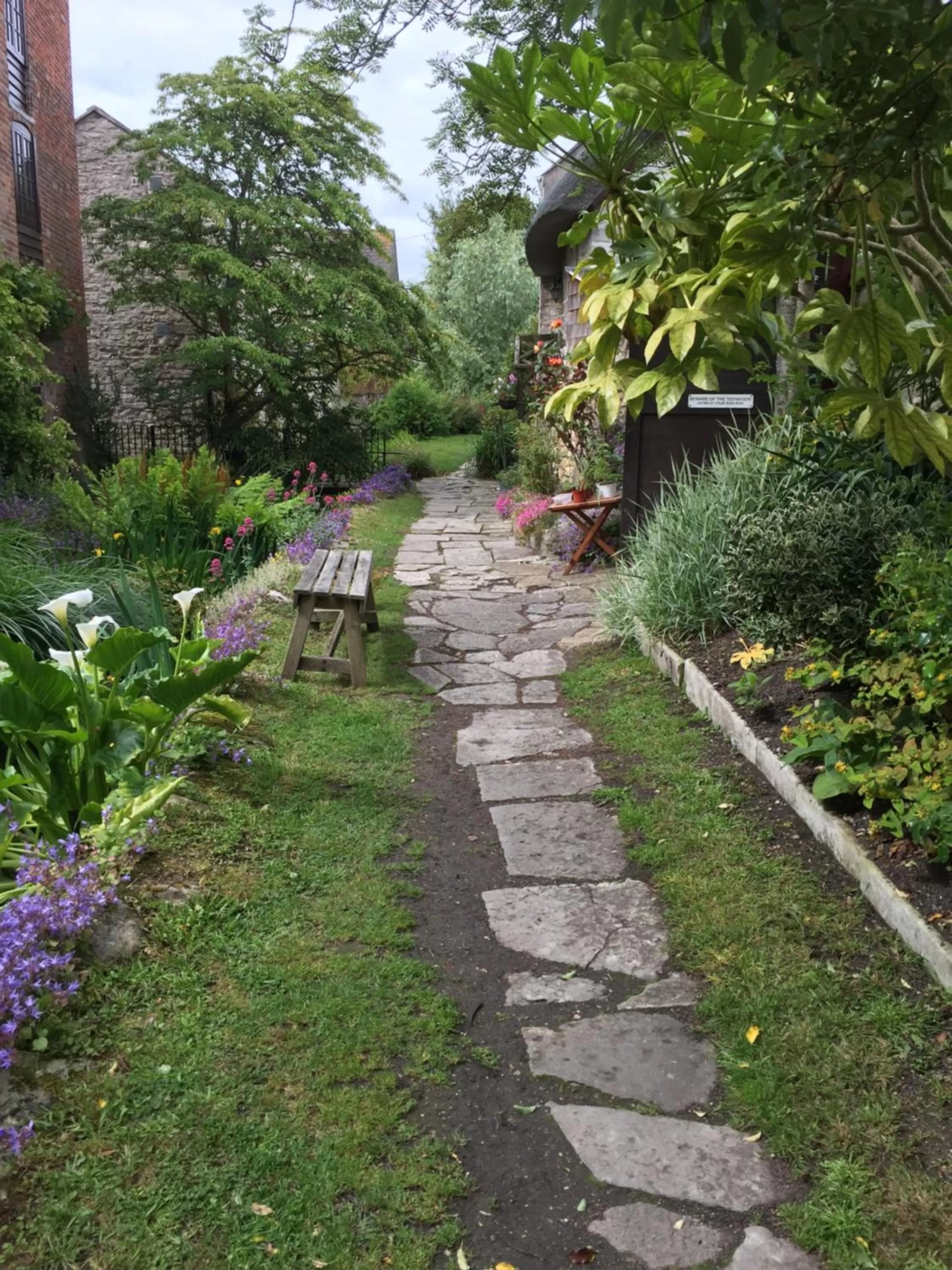 Spring, Garden in Blue Shutters