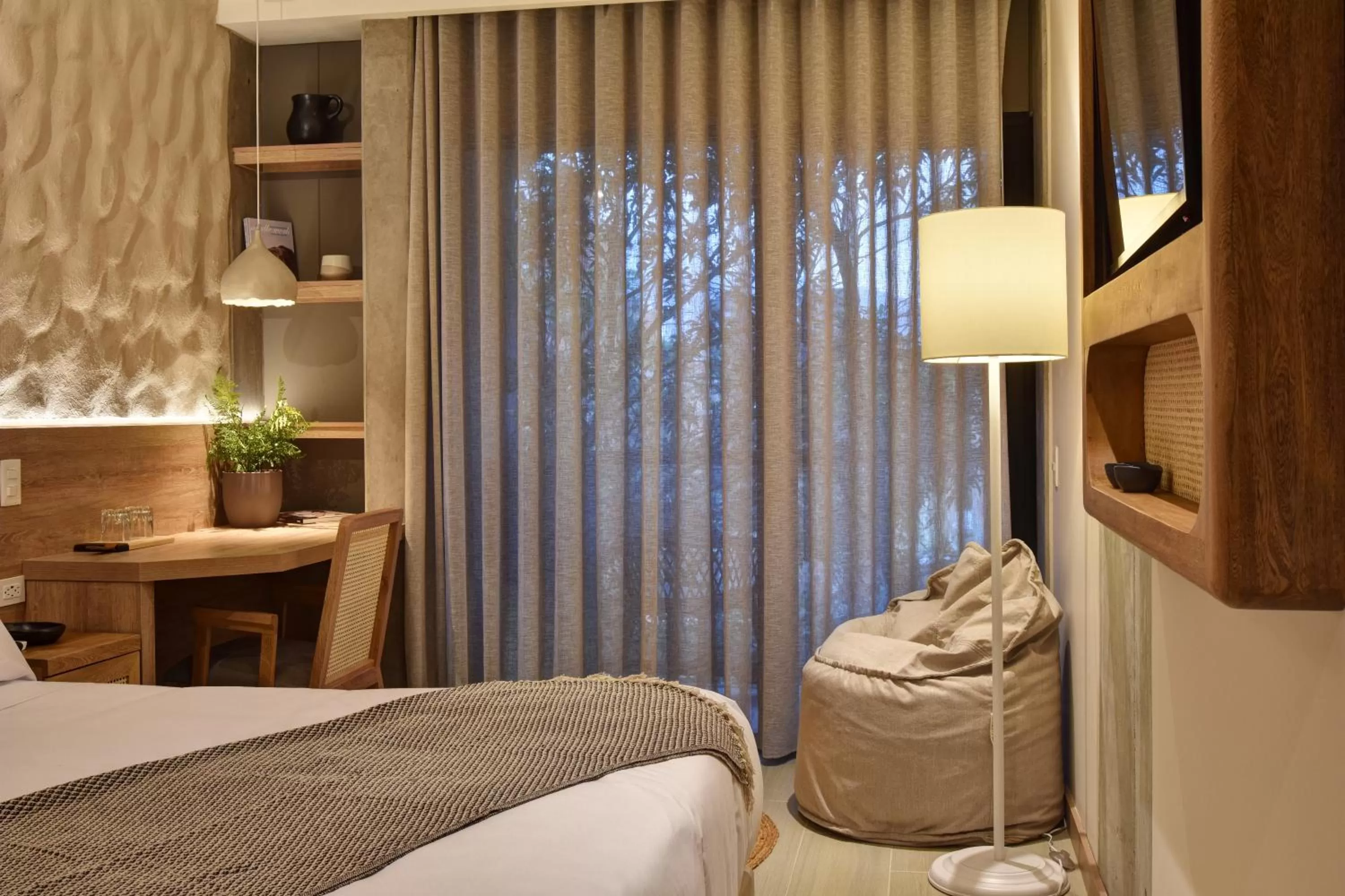 Seating area, Bed in Landmark Hotel