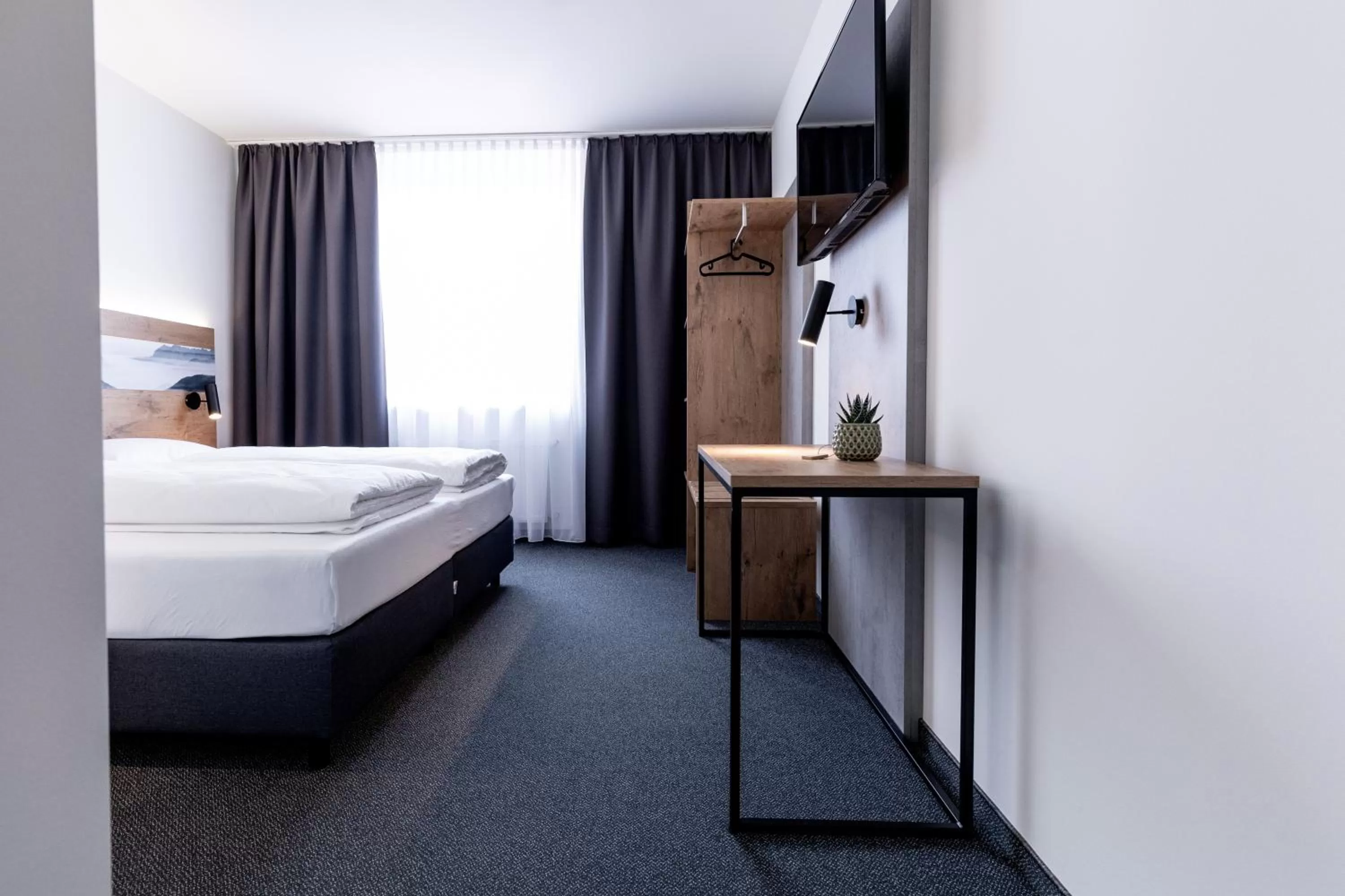 Bed in Stadthotel Freilassing