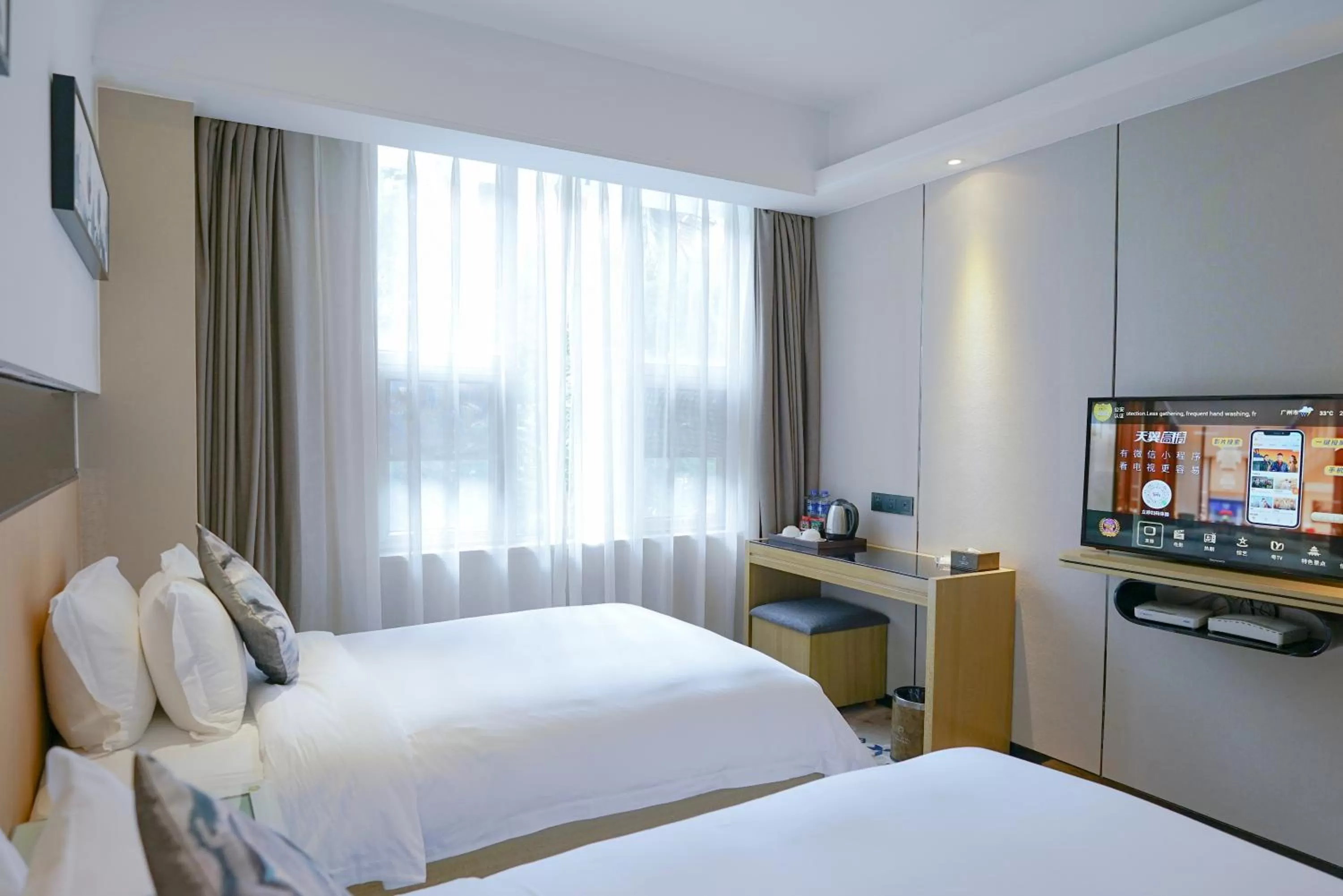 Bed in Paco Hotel Tiyuxilu Metro Guangzhou-Free Shuttle Bus fir Canton Fair