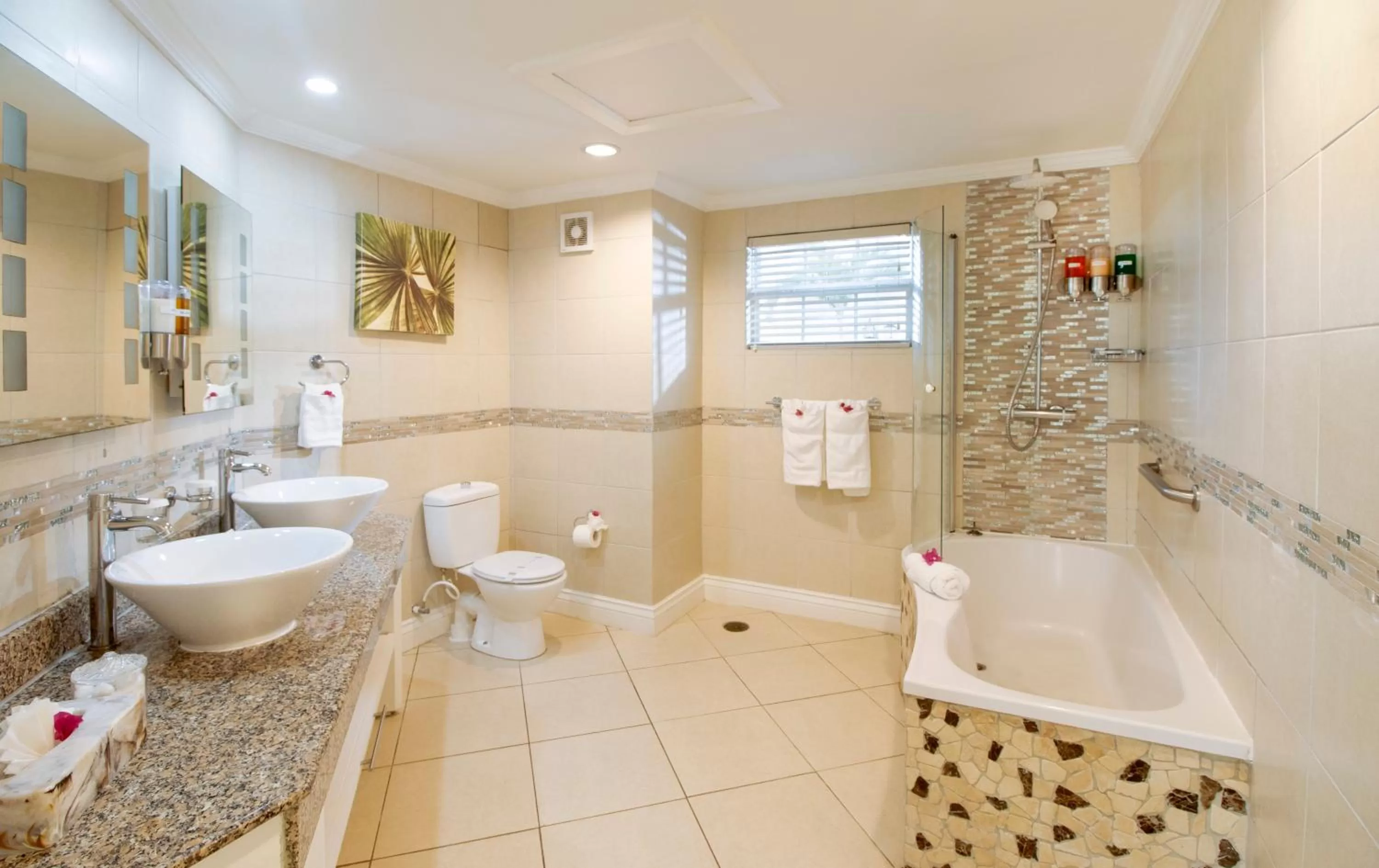 Bathroom in Bay Gardens Beach Resort & Spa