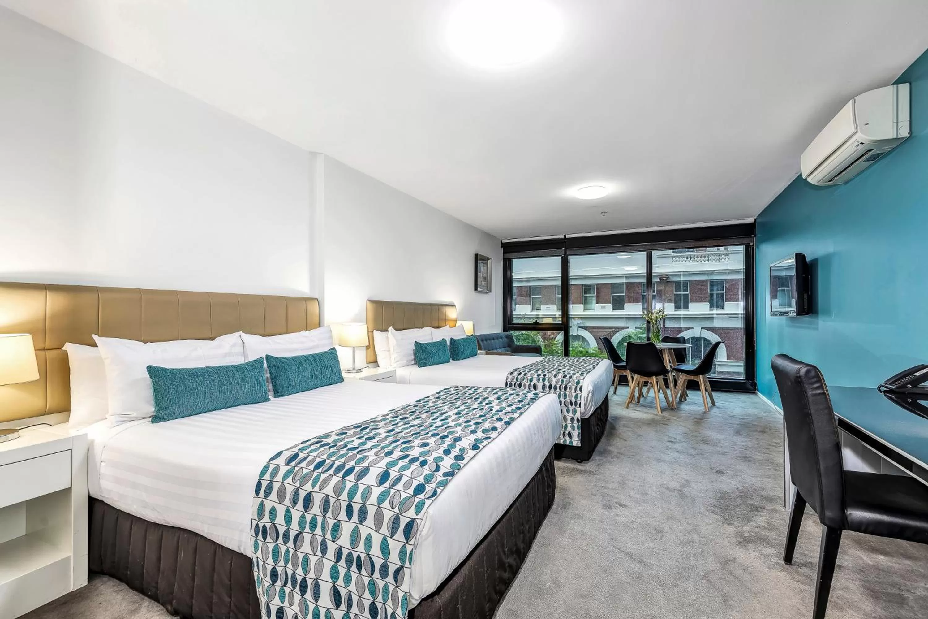 Bed in Pegasus Apart-Hotel