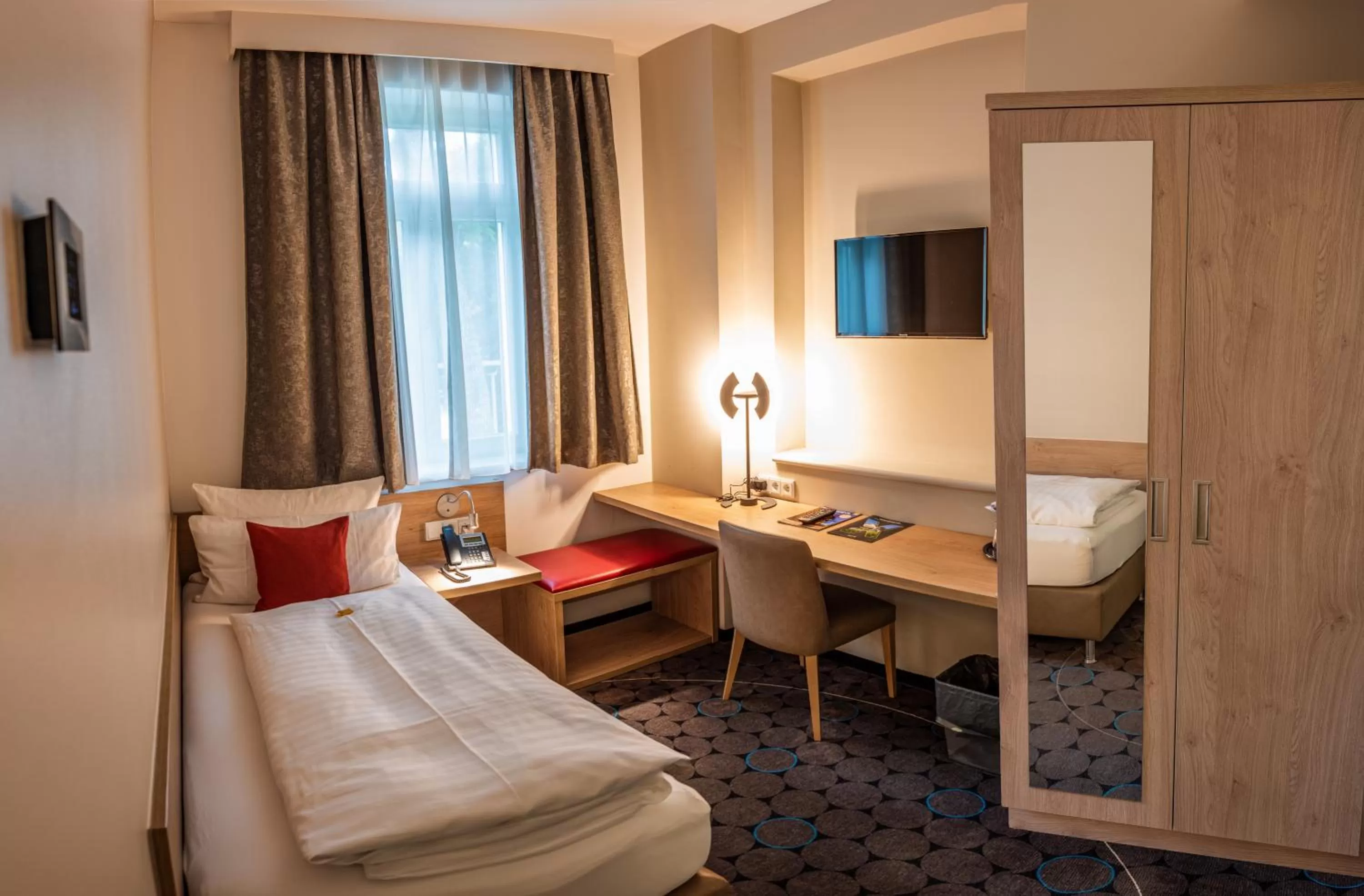 Bedroom, Bed in AKZENT Hotel Villa Saxer