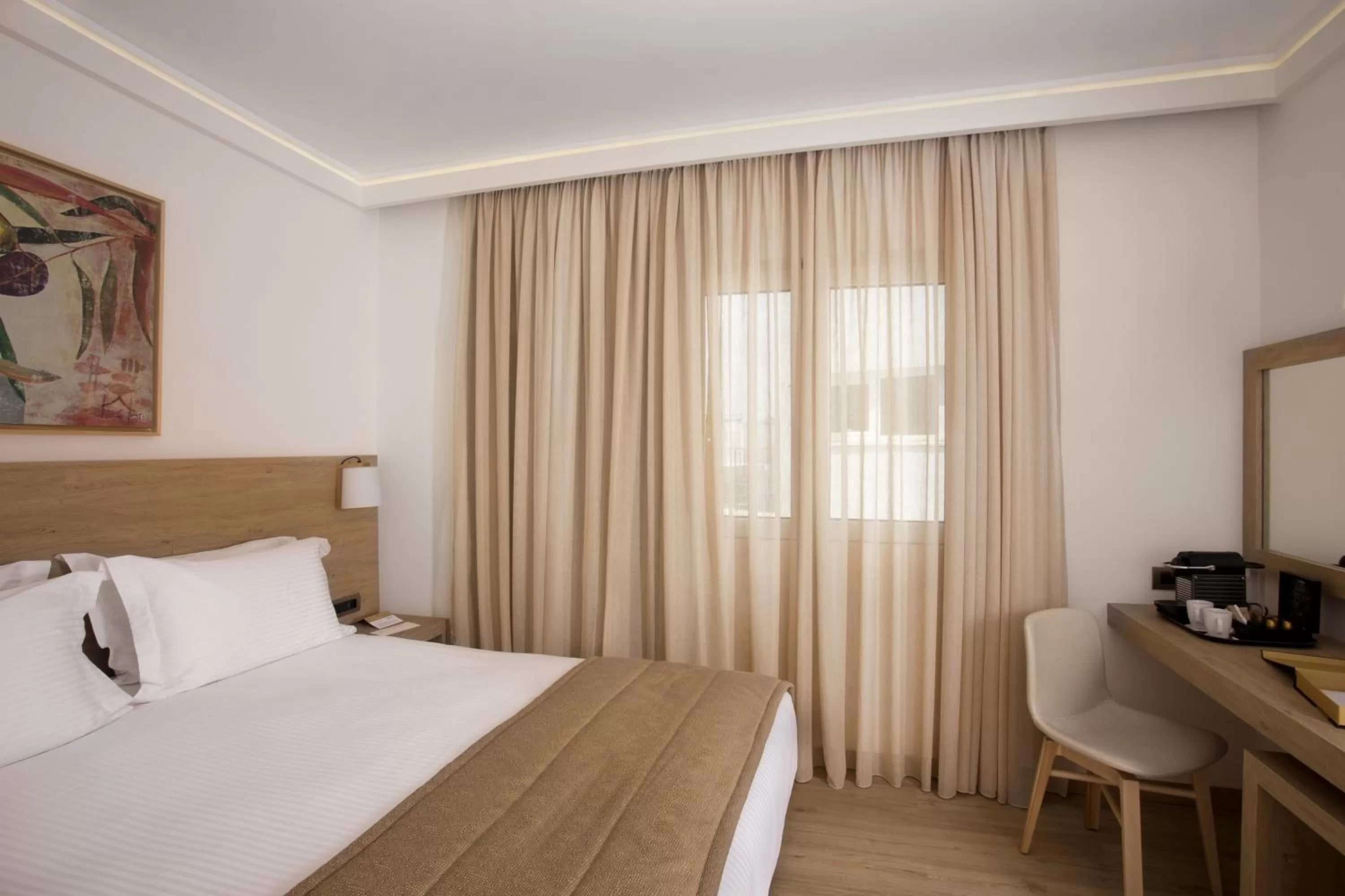 Bed in Golden Age Athens Hotel