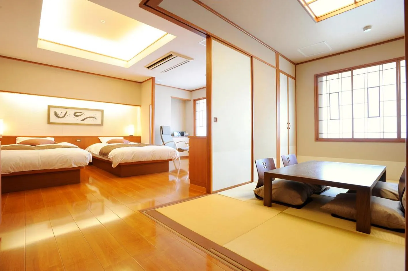 Living room, Bed in Hotel Taisetsu Onsen&Canyon Resort