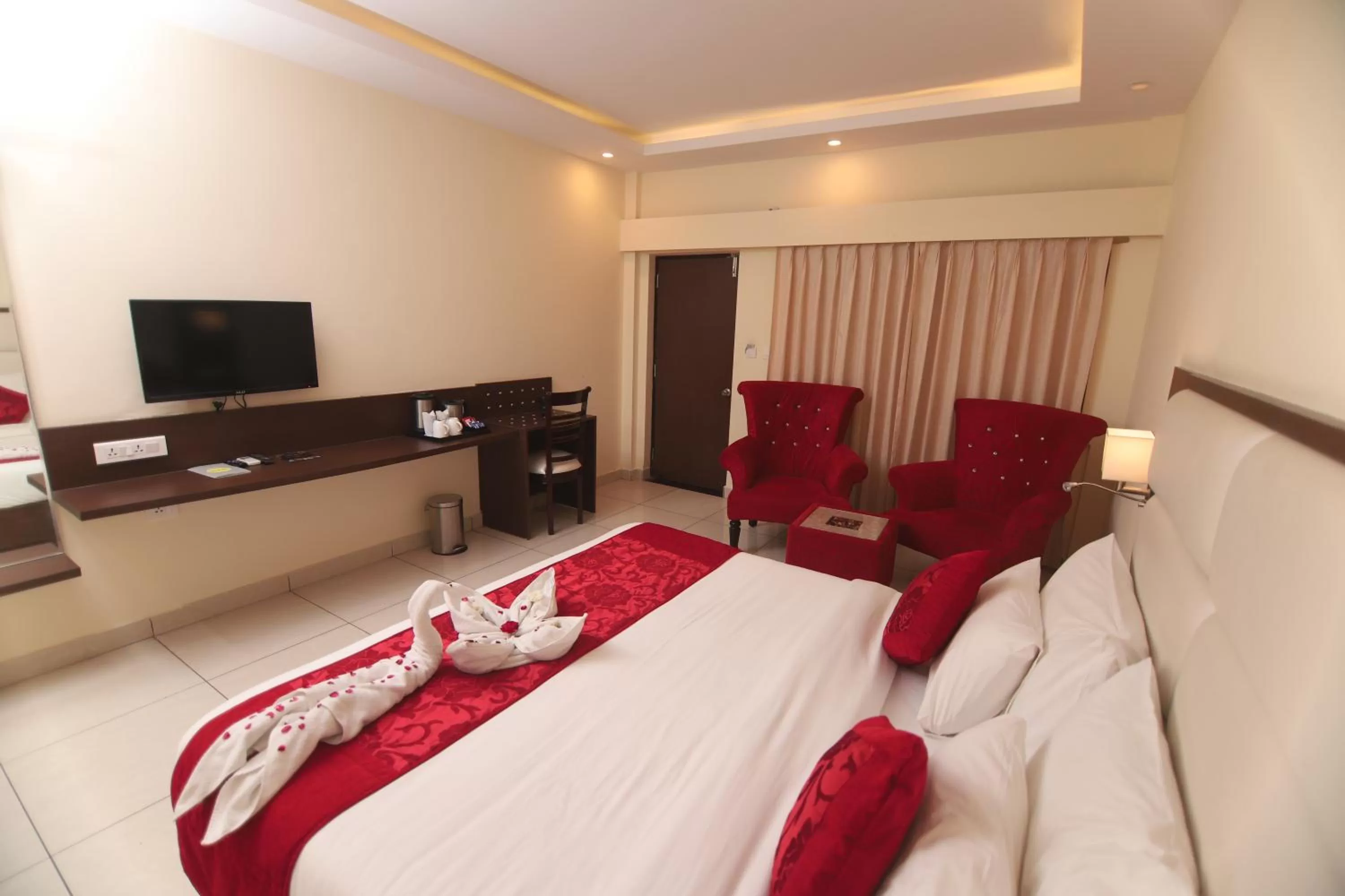 Photo of the whole room, Bed in Indira Nikunj Rubystone Exotic