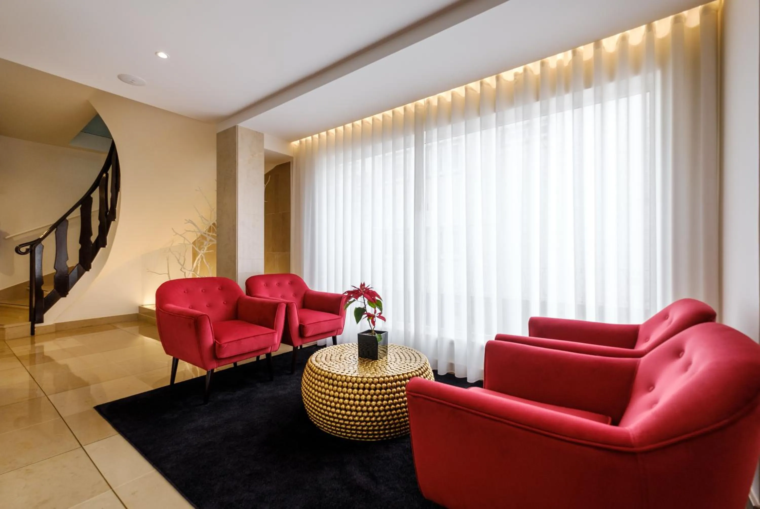 Communal lounge/ TV room in Hotel Regina