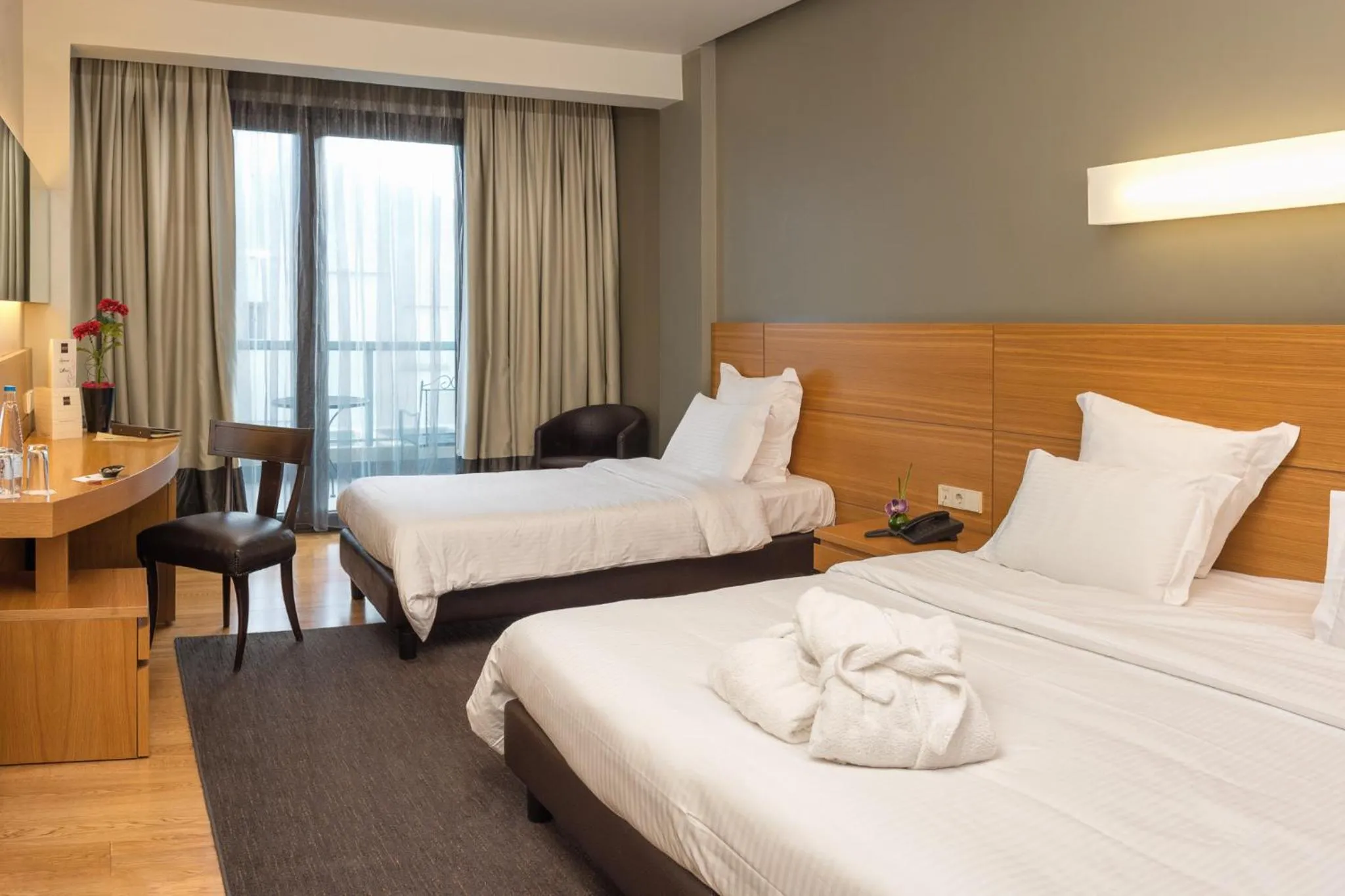 Bed in Esperos Palace Luxury & Spa Hotel