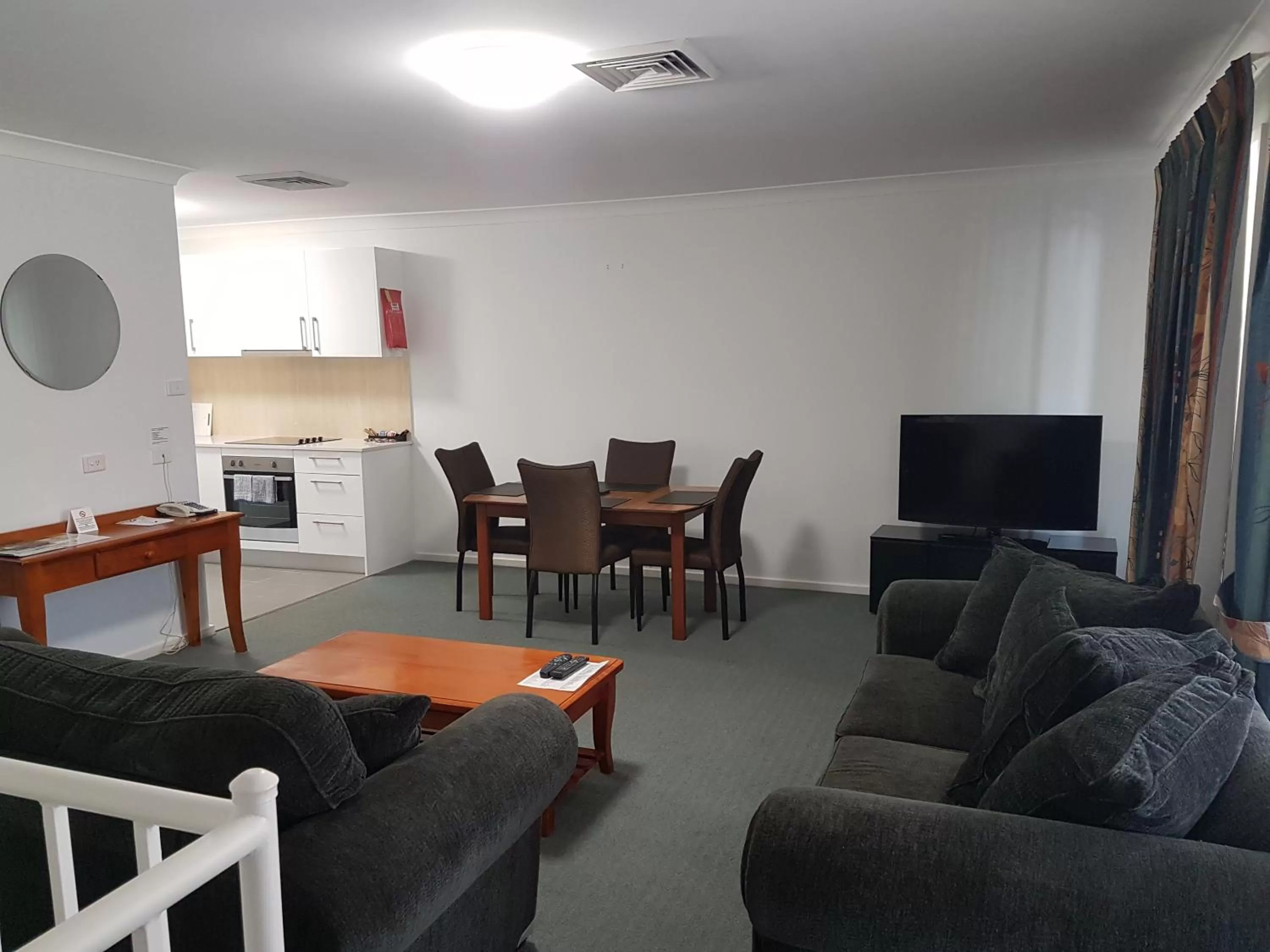 Living room in Mid City Motor Inn Singleton