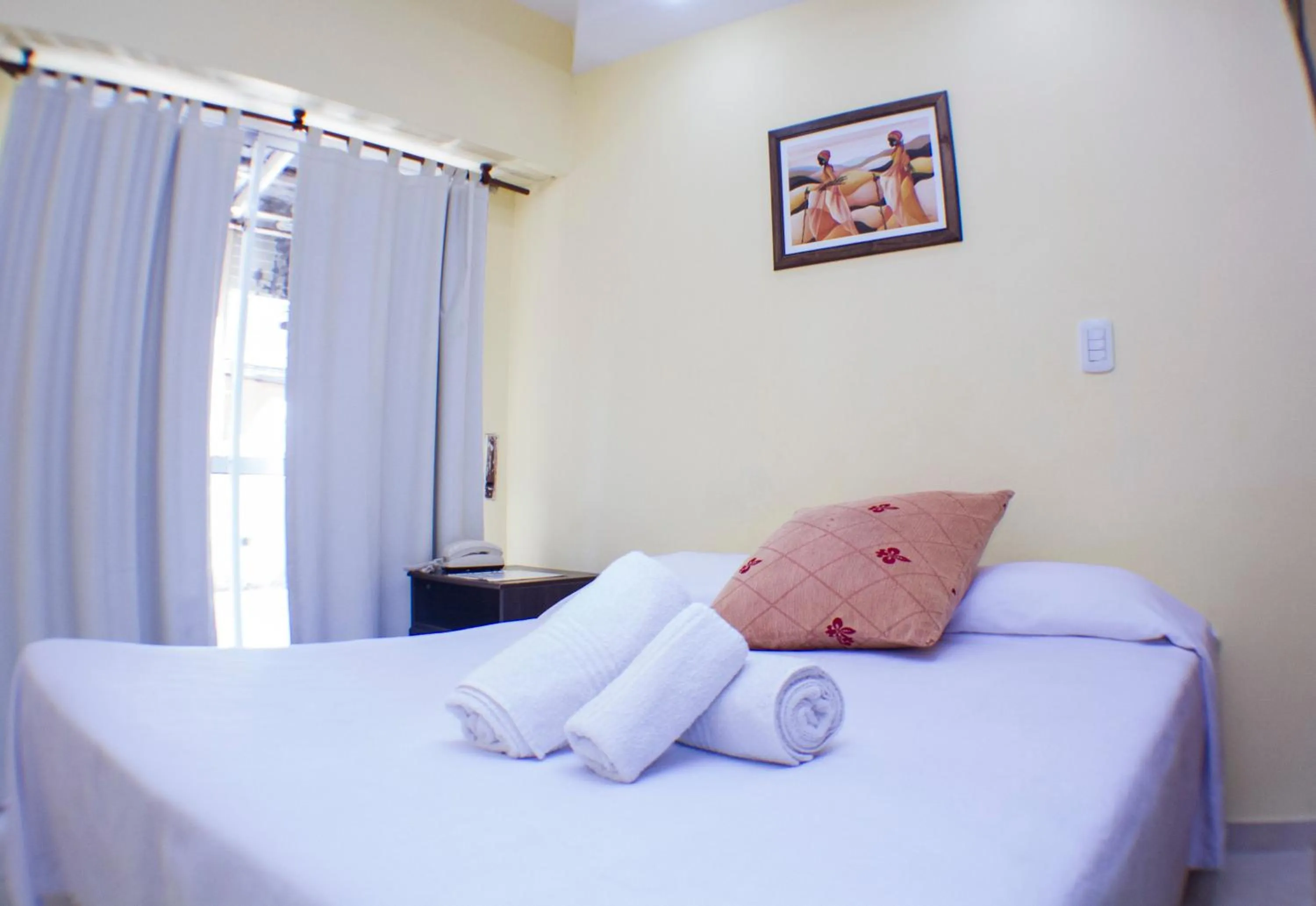 Bed in San Remo City Hotel