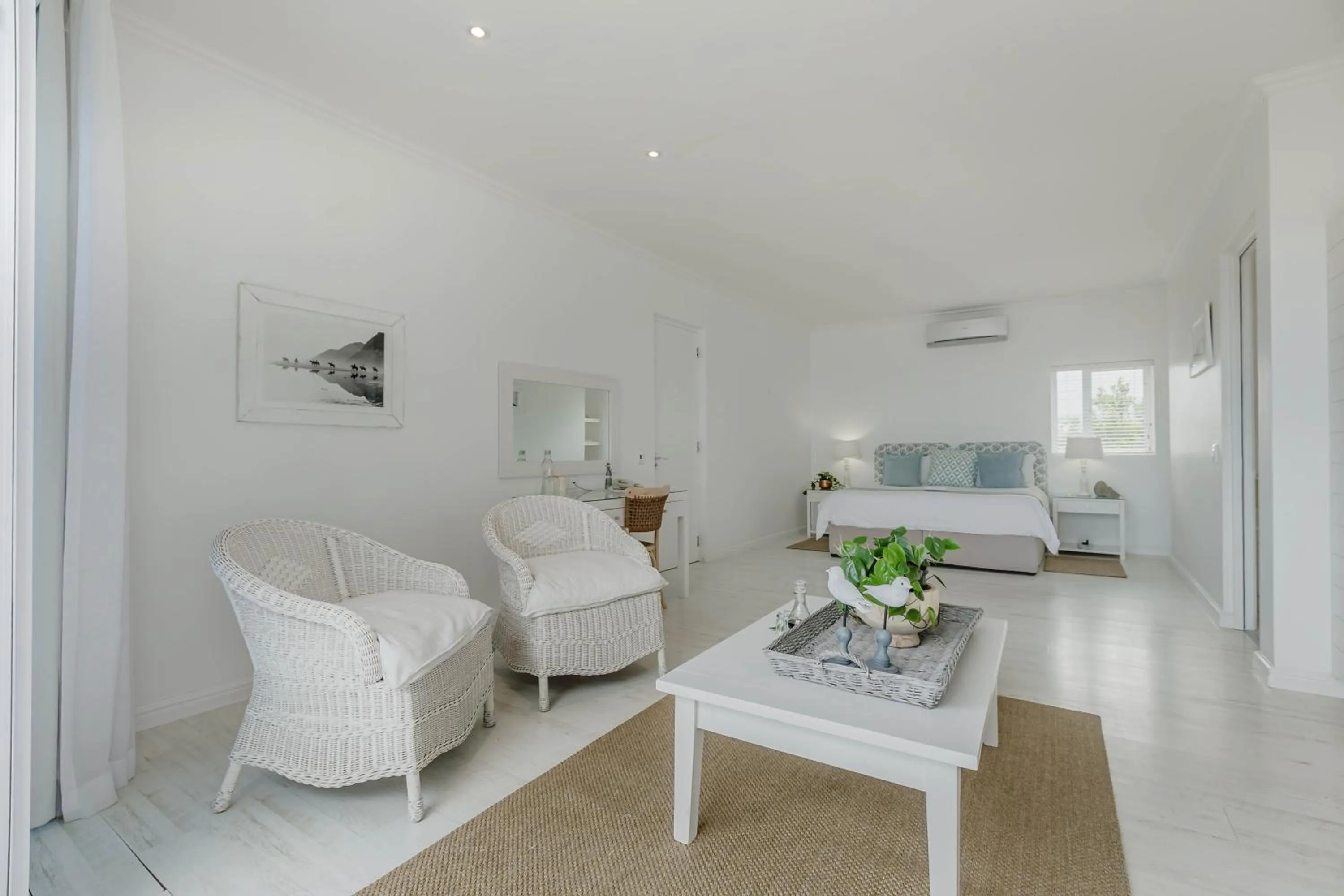 Living room, Bed in The Robberg Beach Lodge - Lion Roars Hotels & Lodges