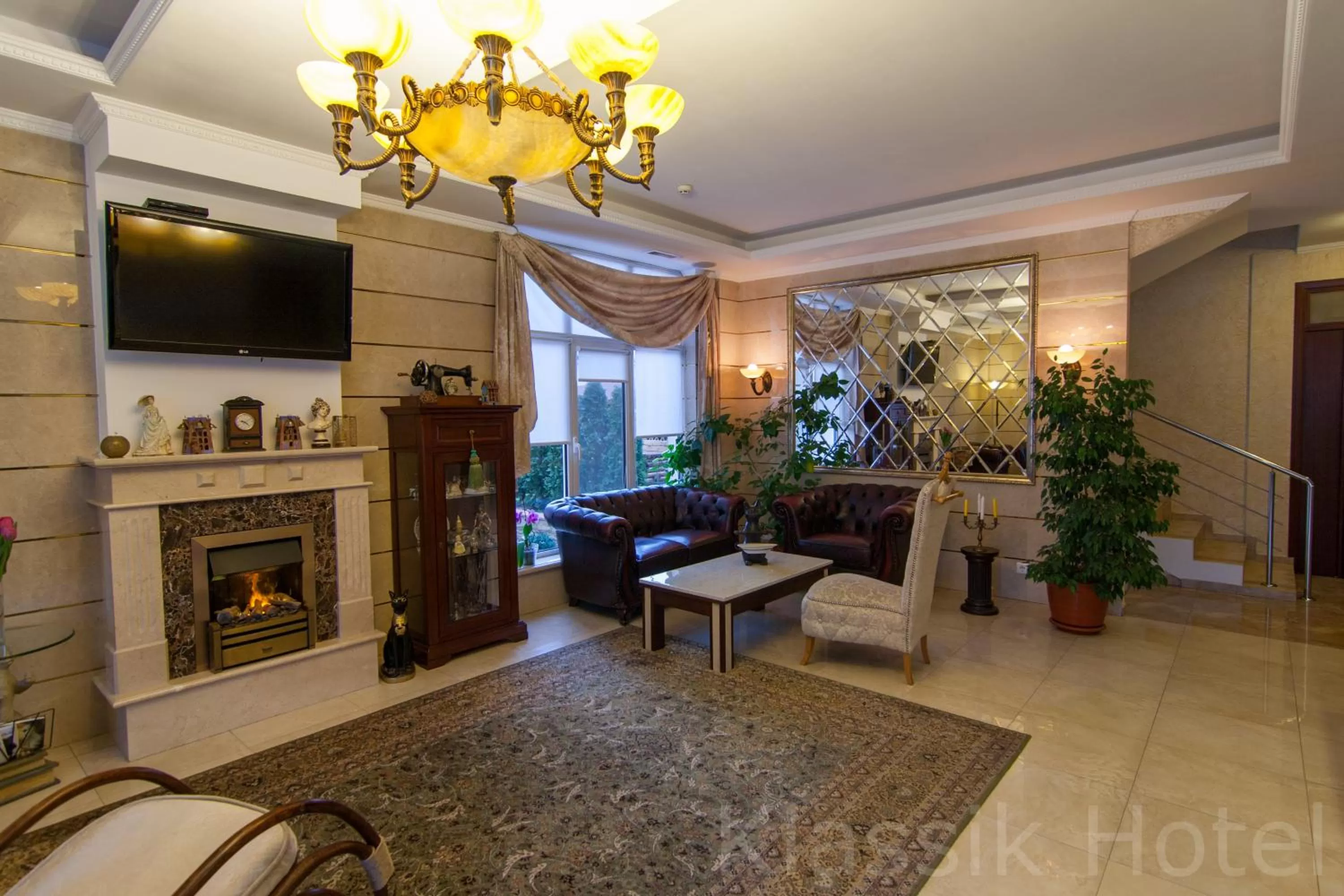 Communal lounge/ TV room in Klassik Hotel