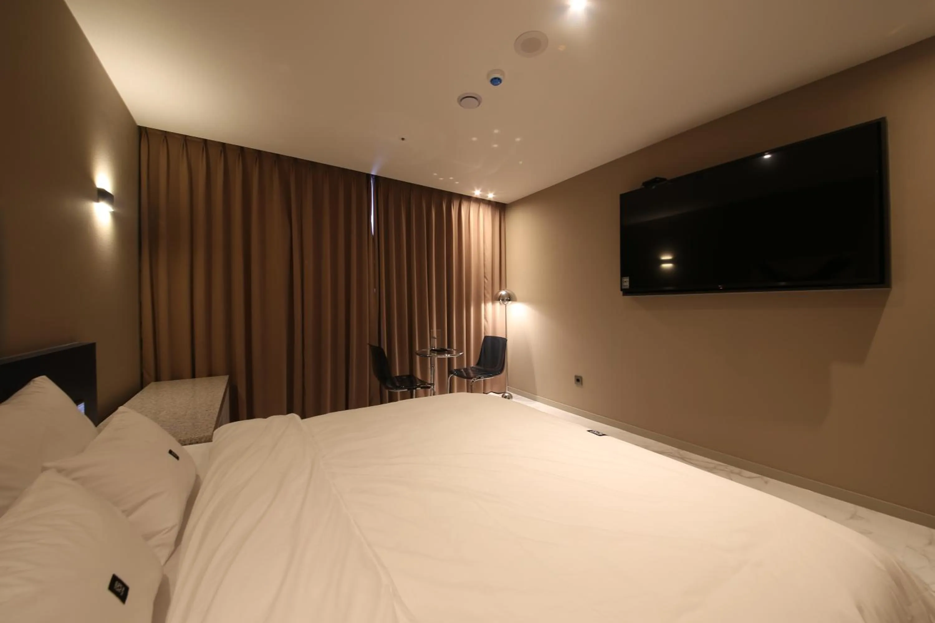 Bed in Zam101 Hotel Gimhae