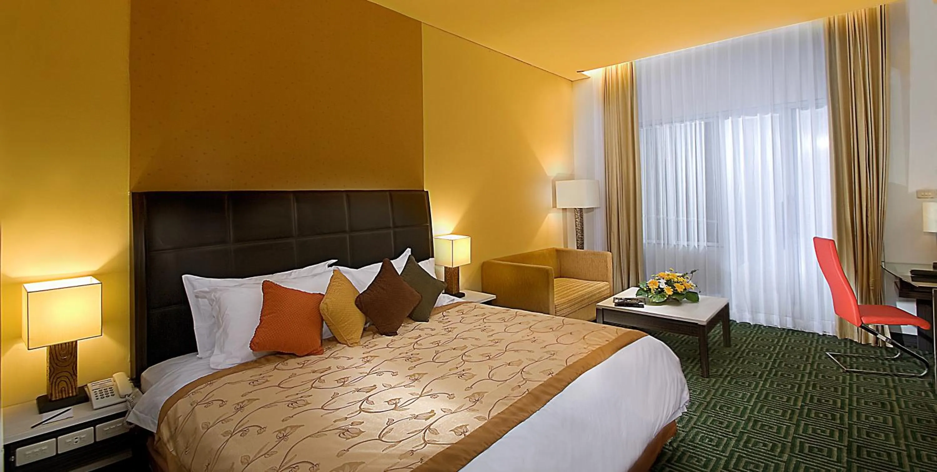 Photo of the whole room, Bed in Golden Flower by KAGUM Hotels