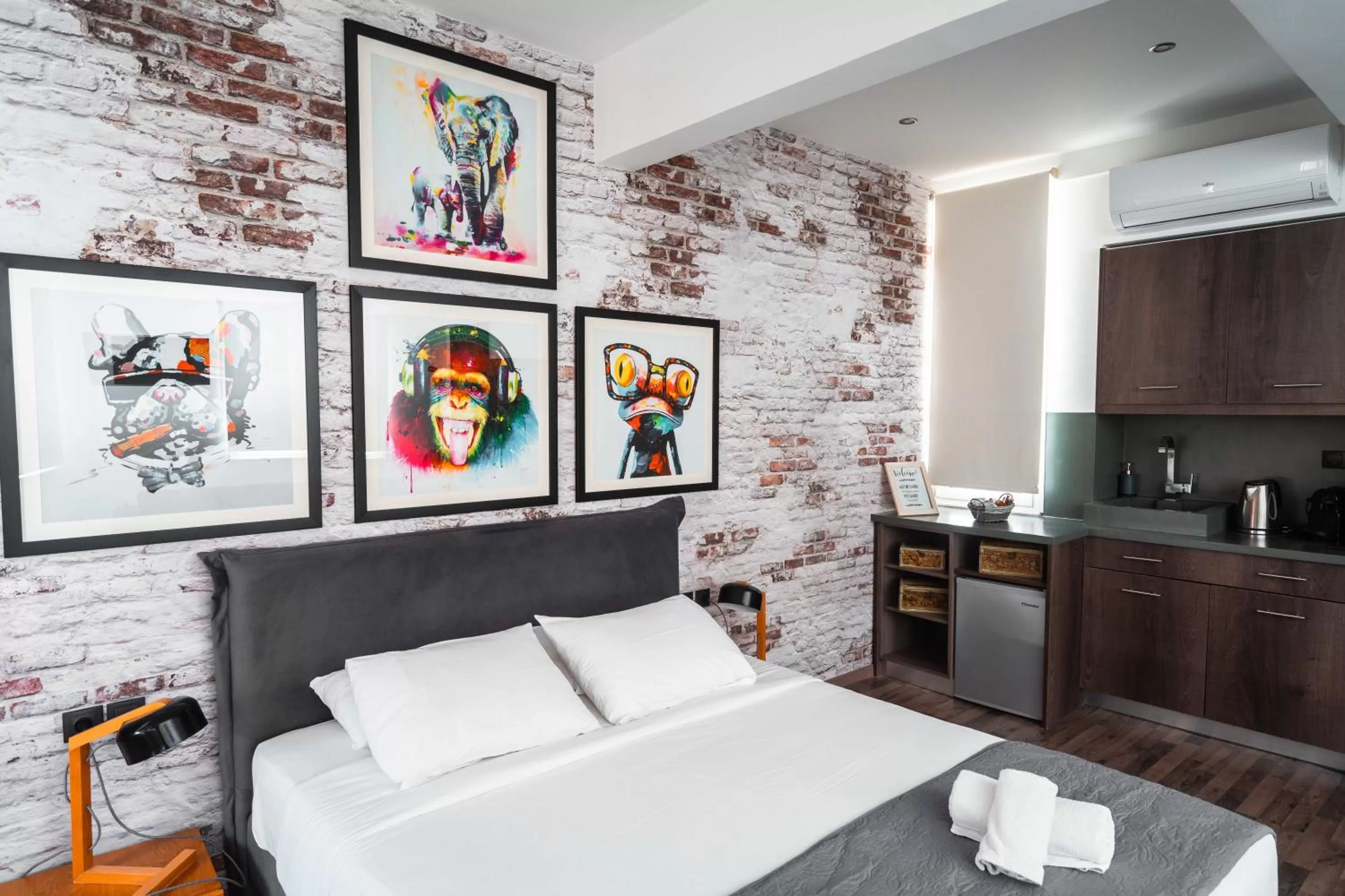 Bed in The Athens Version Luxury Suites