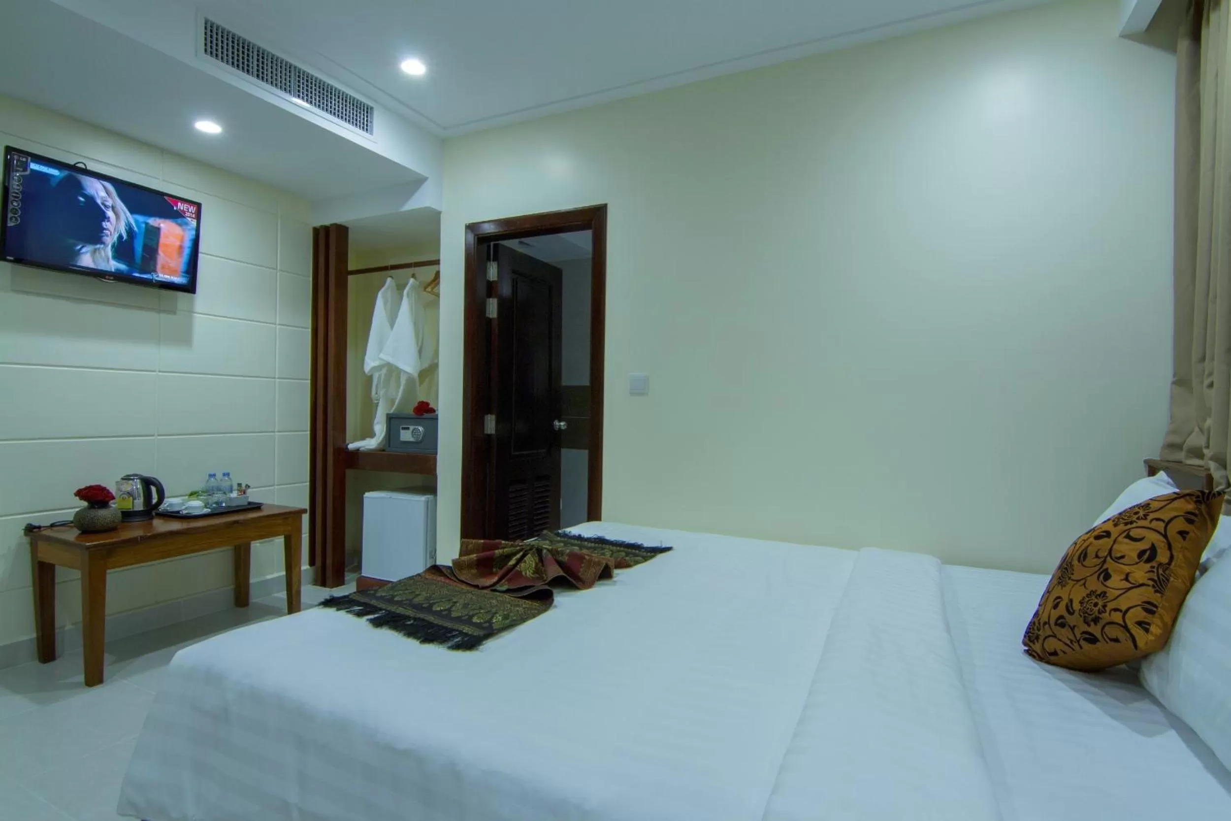 Bed in Rose Emerald Hotel