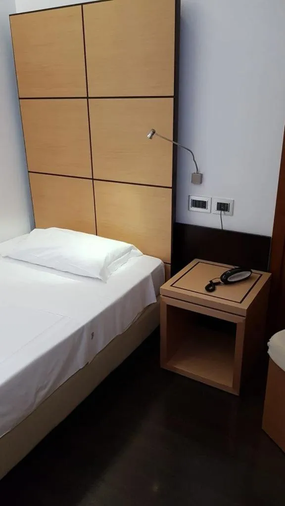 Bed in Hotel Cimarosa