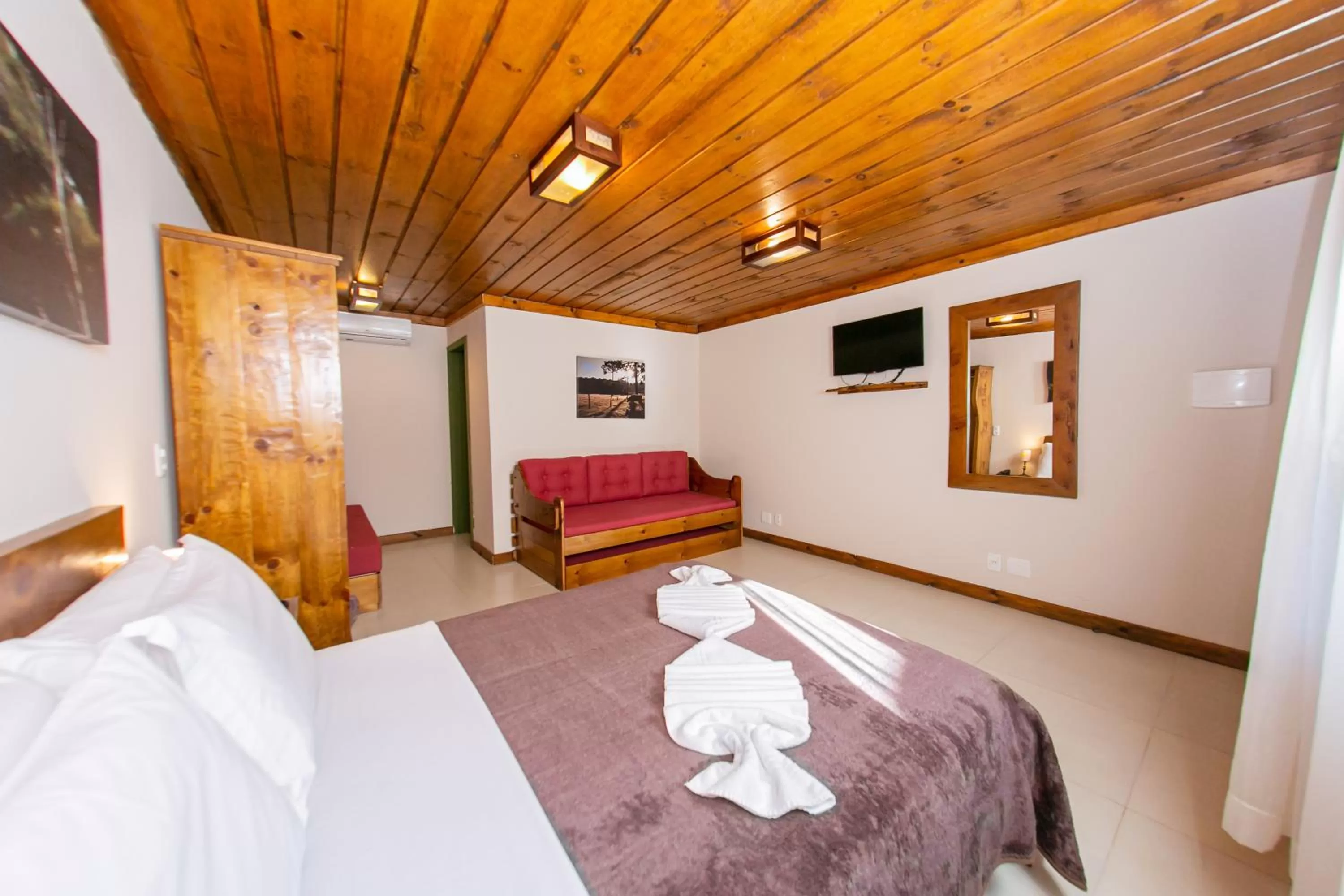 Bed in Pousada Charm Canela