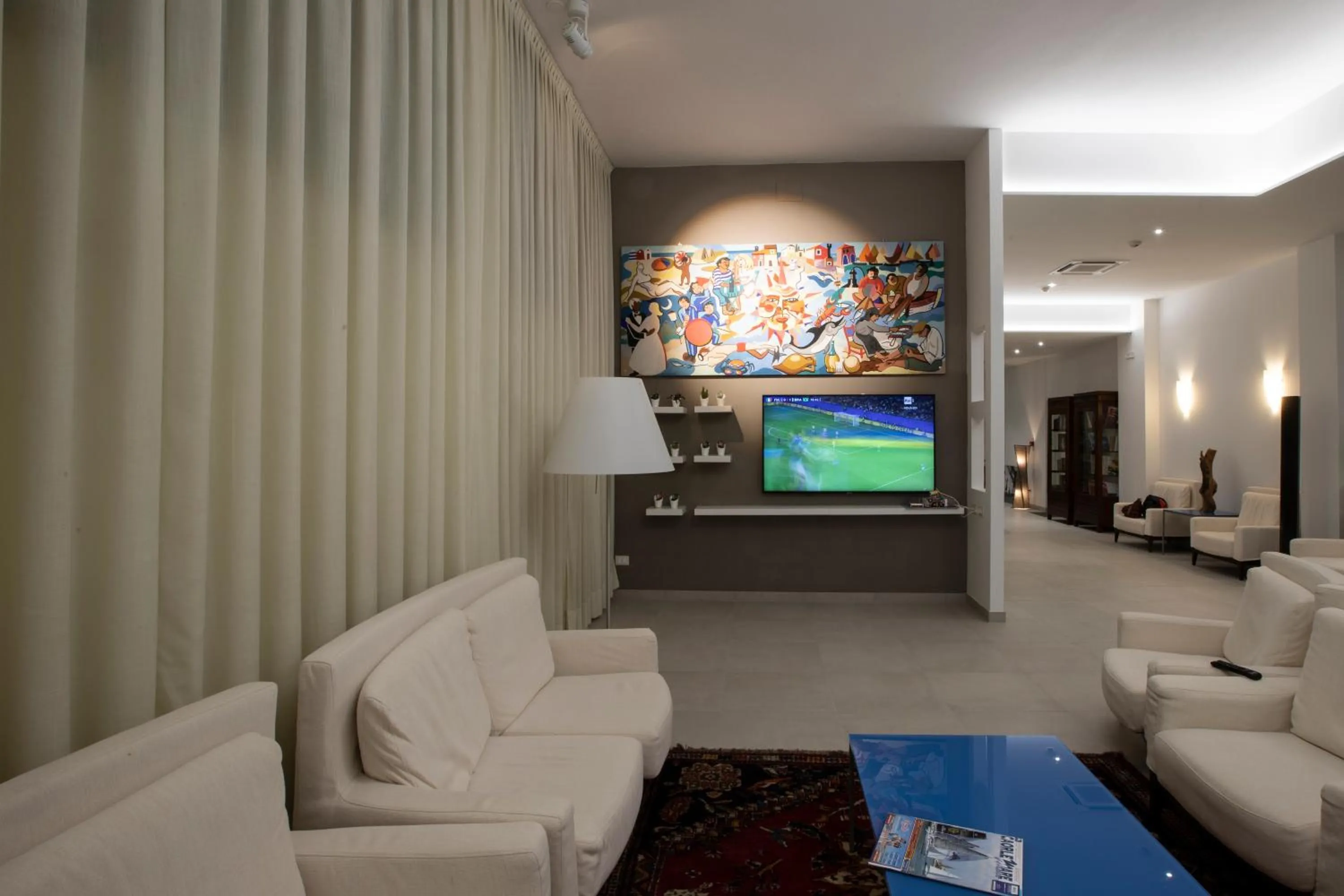 Communal lounge/ TV room in Hotel Marco Polo