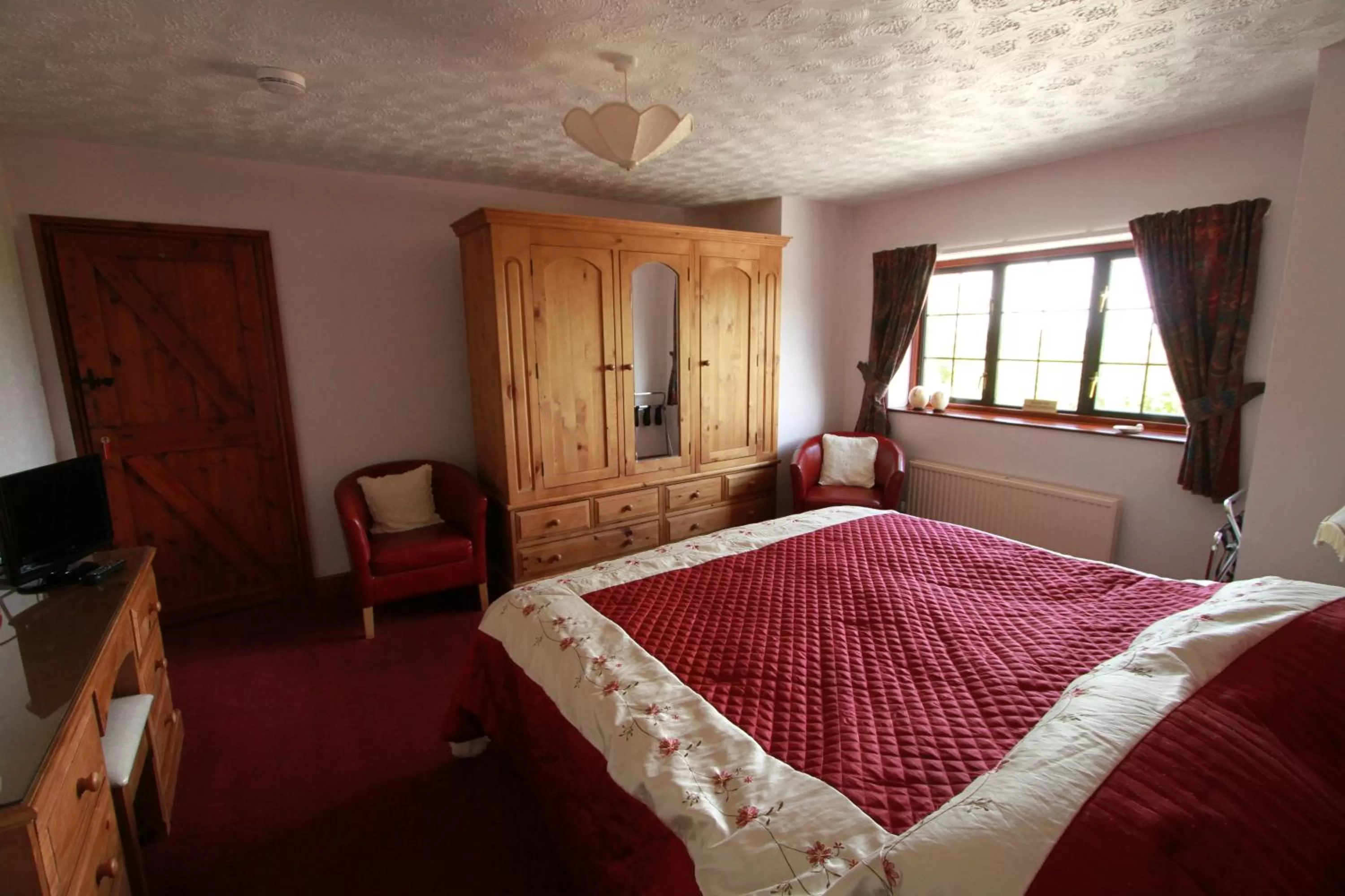 Bed in Pointers Guest House