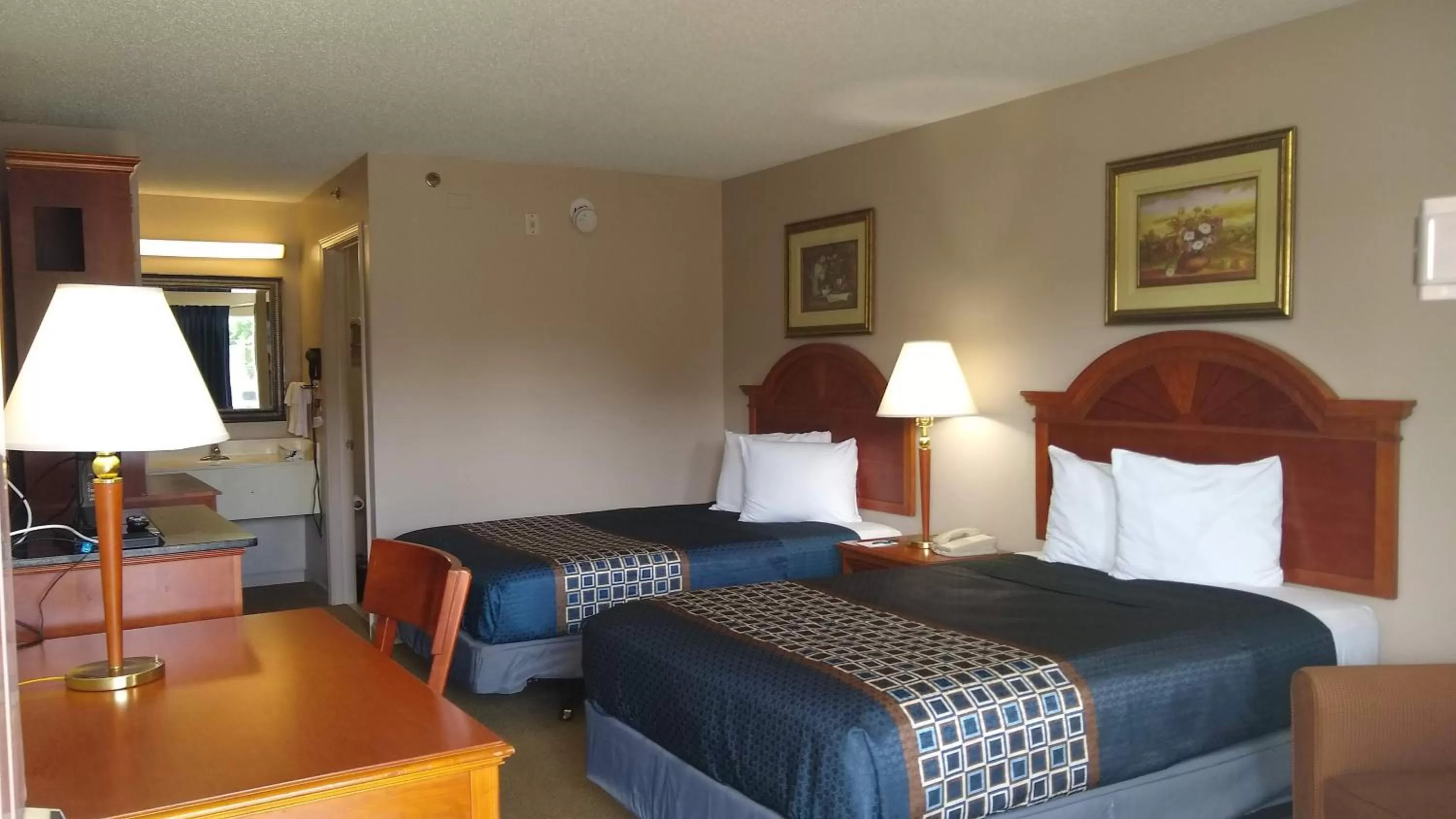 Bedroom, Bed in Carom Inn Denham Springs-BatonRouge