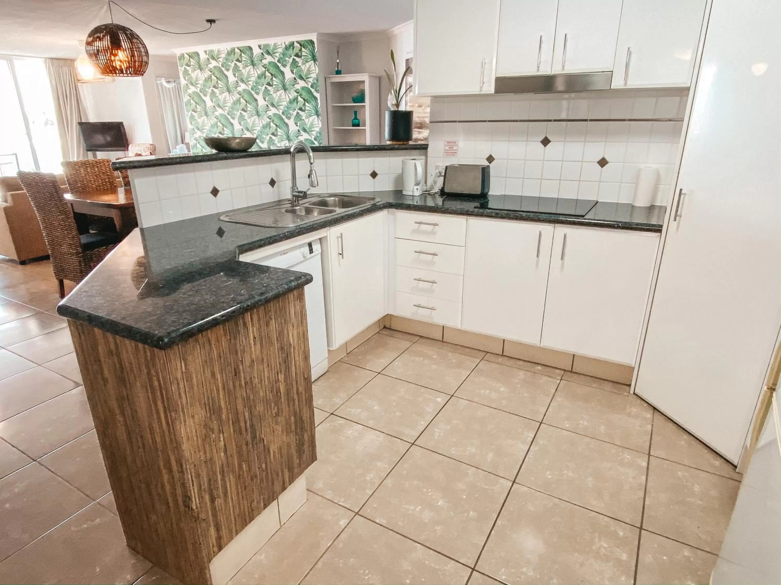 Kitchen or kitchenette in Bargara Blue Resort