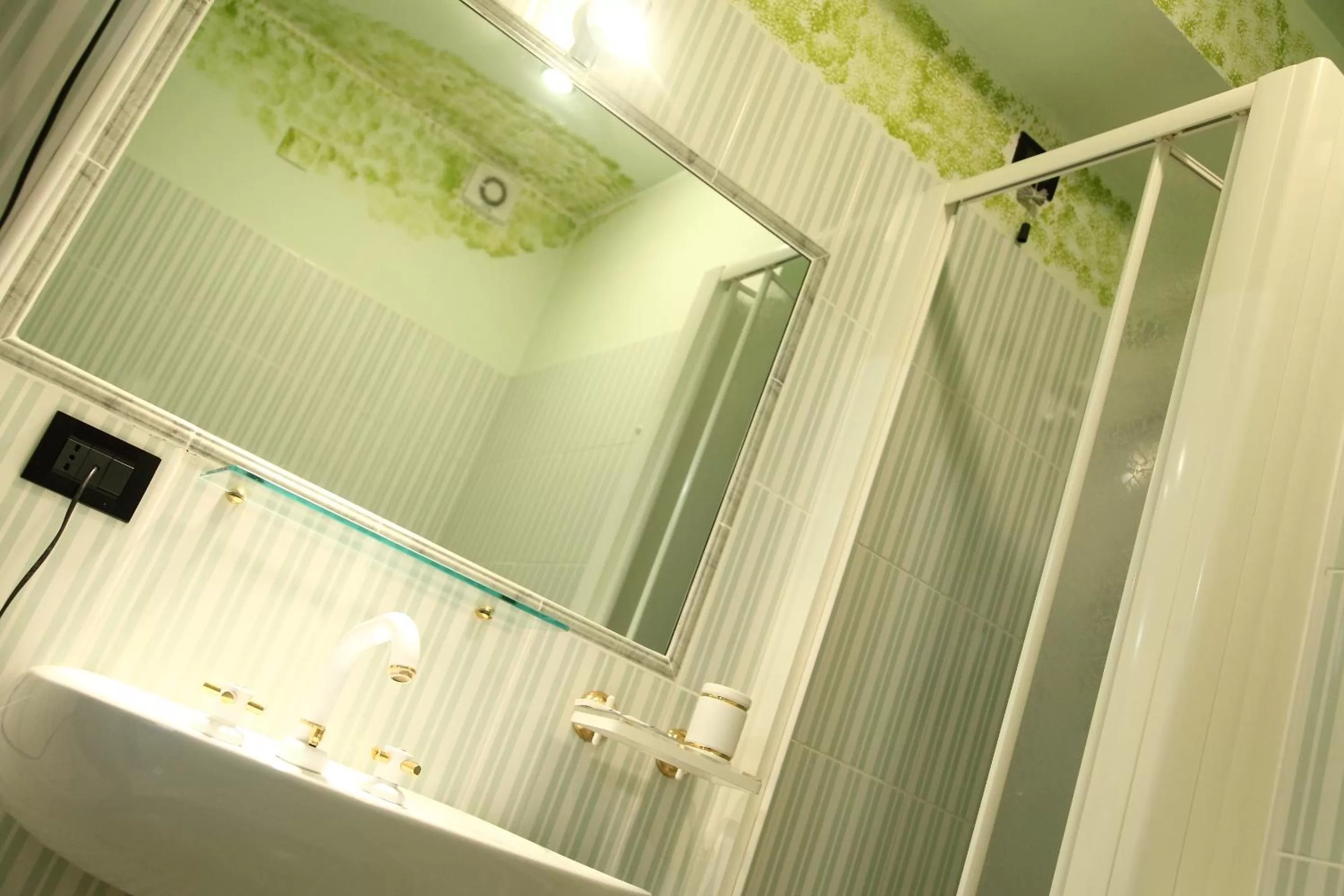 Bathroom in Hotel Le Ceramiche