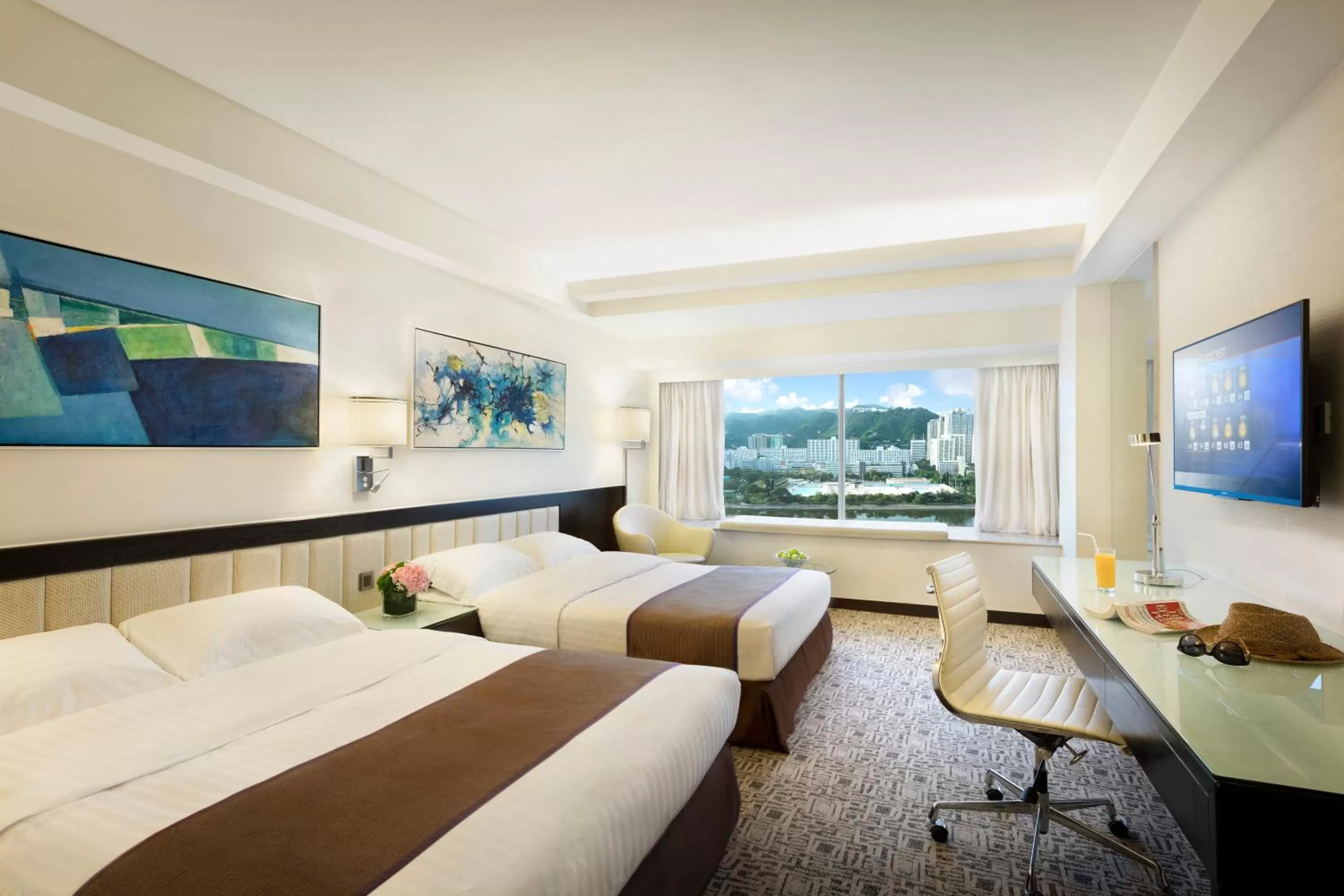 Bed in Regal Riverside Hotel