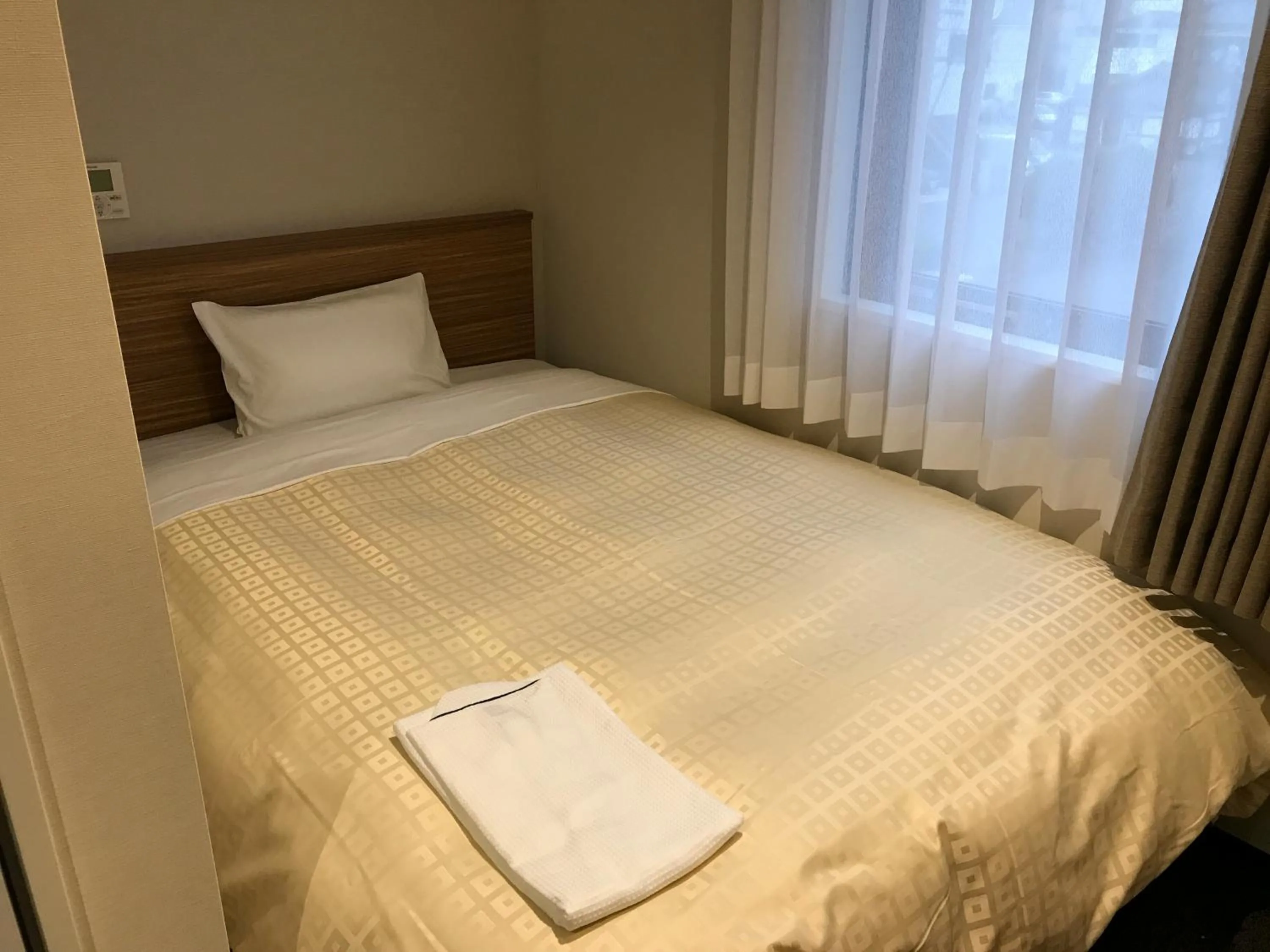 Bed in Hotel Crown Hills Iwaki