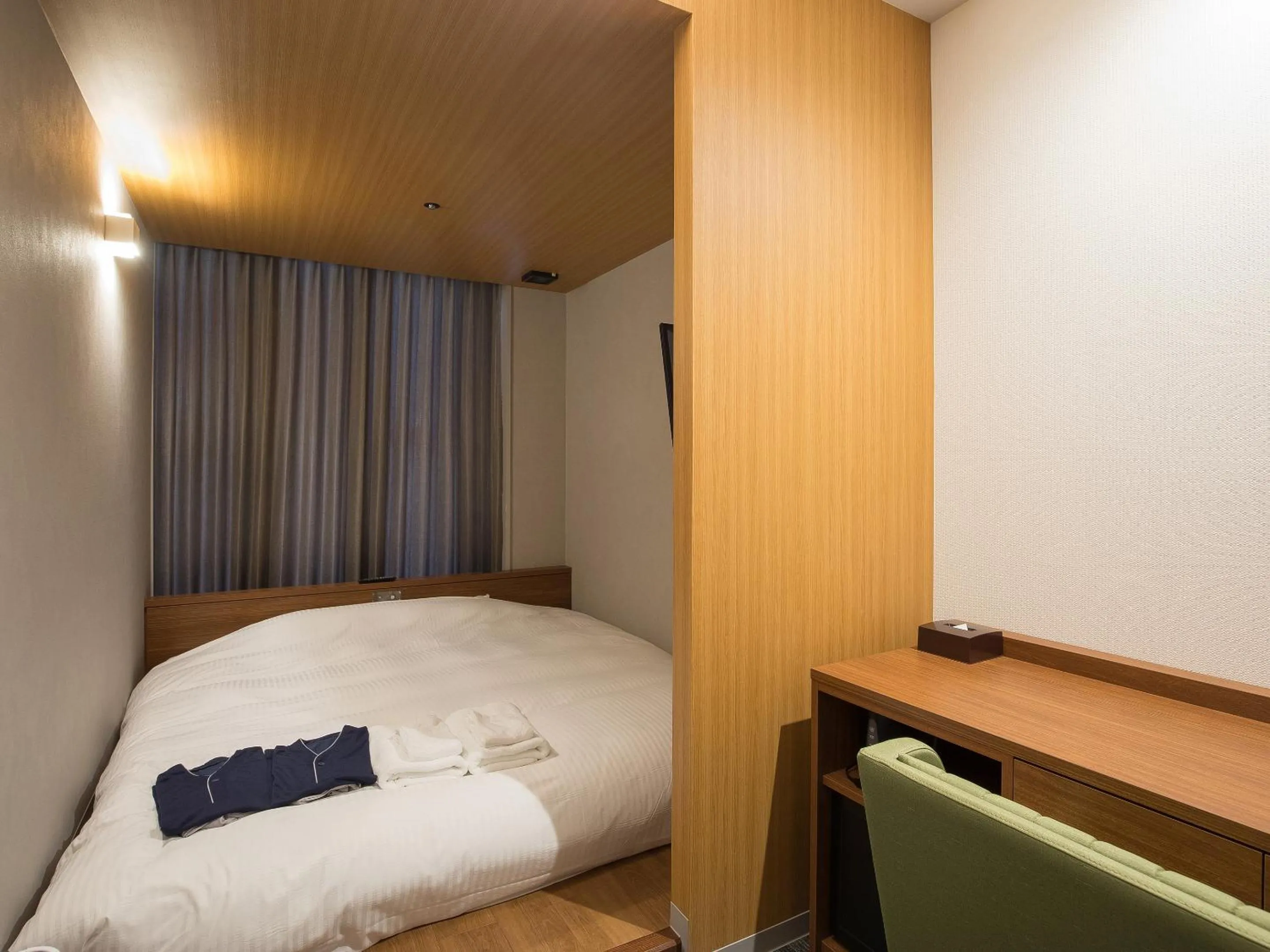 Bed in Gardens Cabin