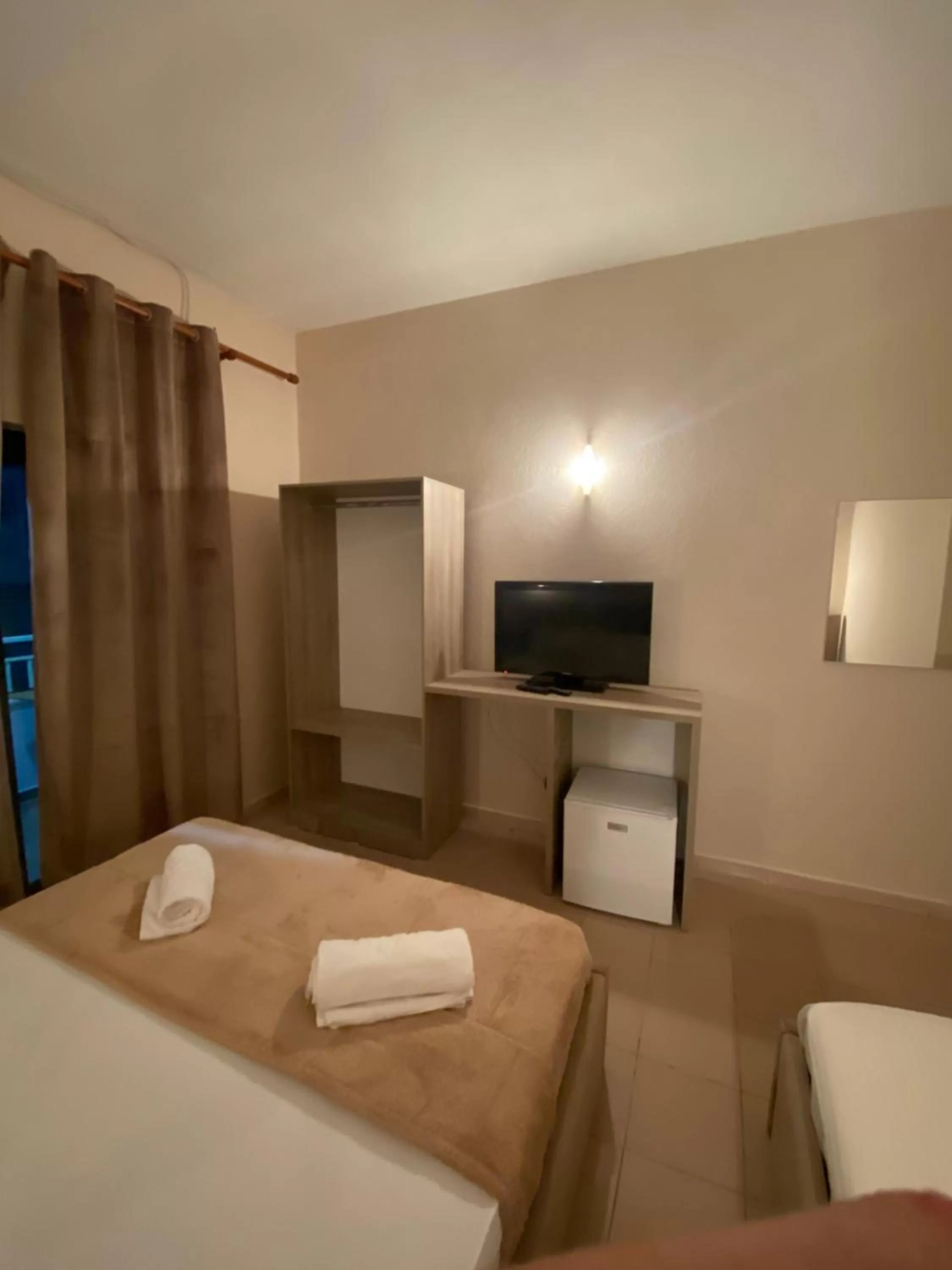 Bed in Seashell Beach Rooms