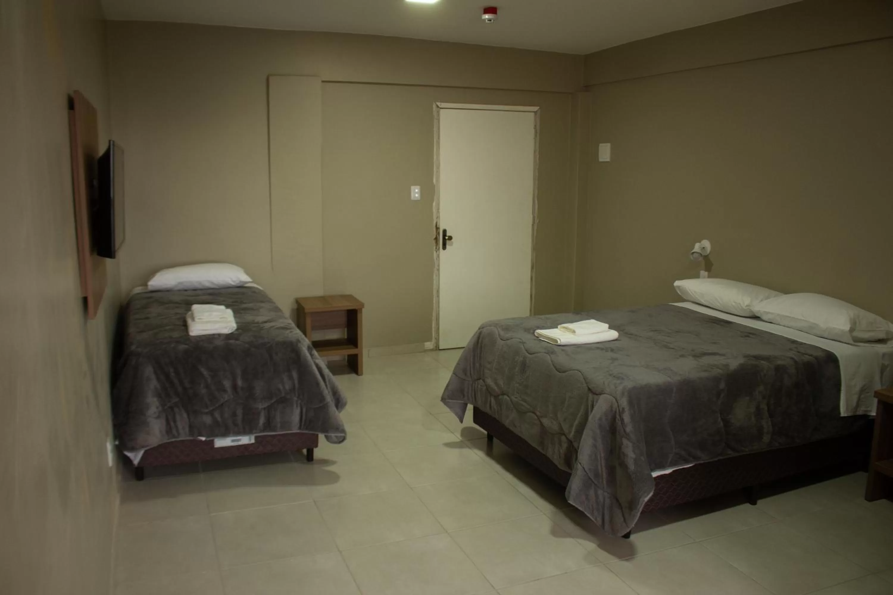 Bed in Hotel Executivo